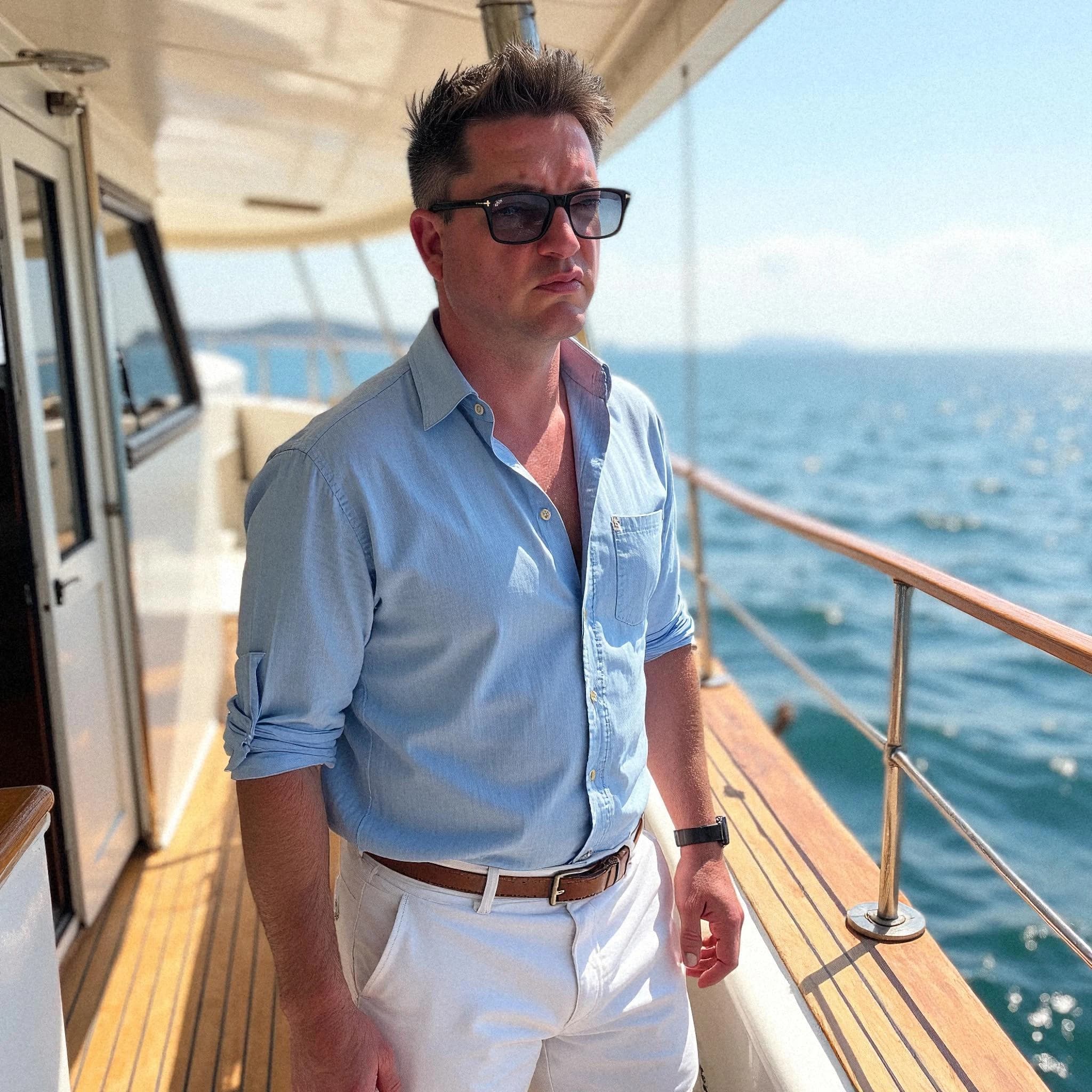 Professional headshot example: Man Boat Blue Shirt Standing — LinkedInHeadshots.ai