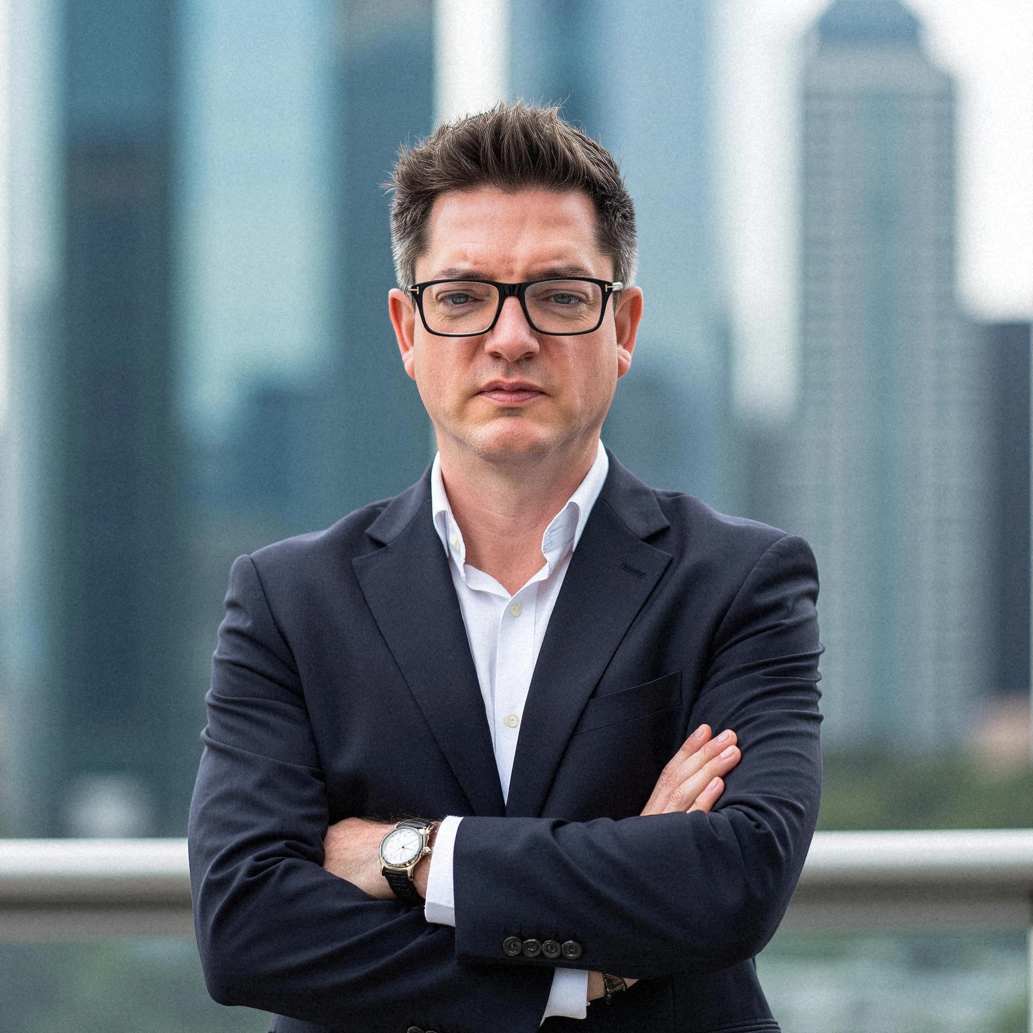 Professional headshot example: Man City Suit Arms Crossed 2 — LinkedInHeadshots.ai