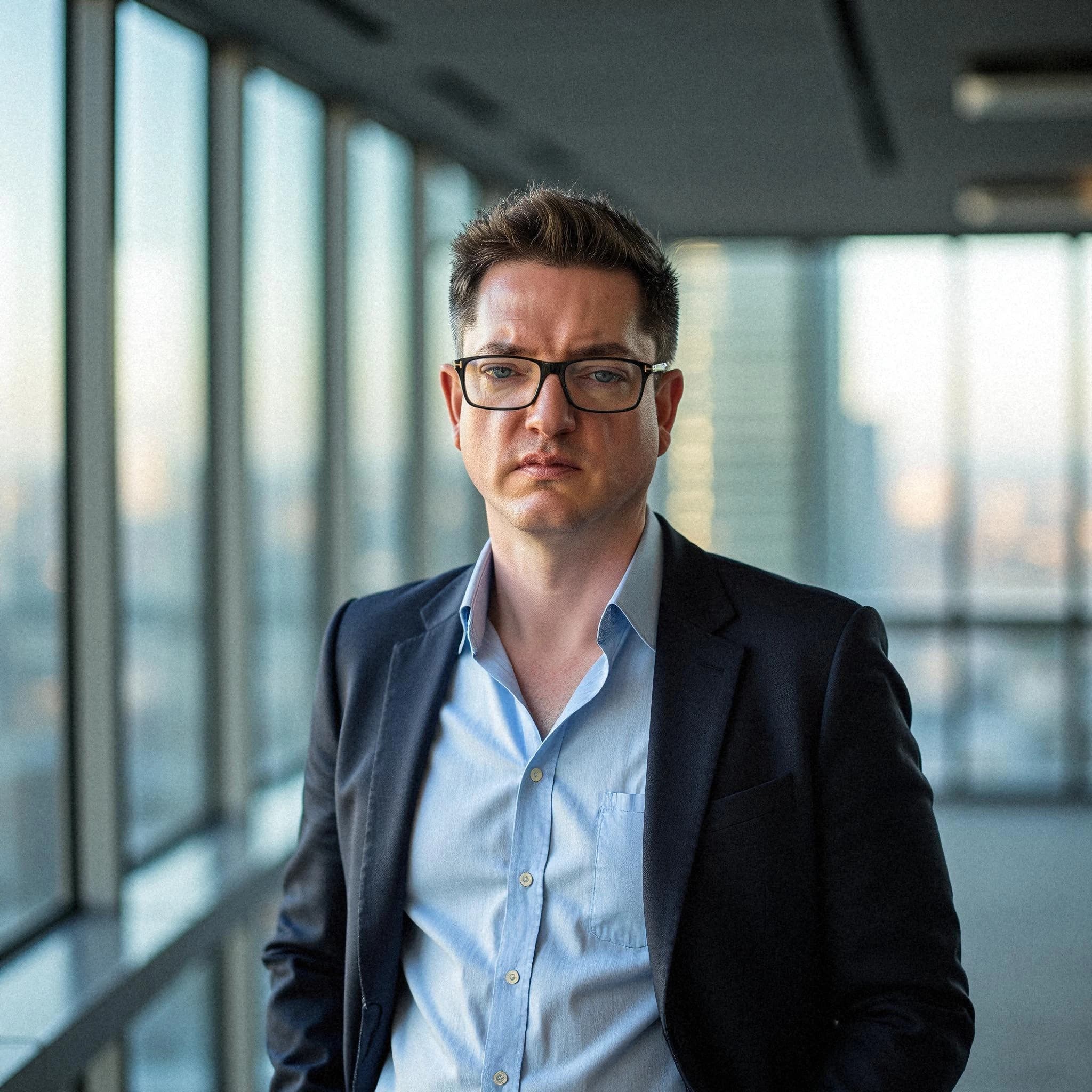 Professional headshot example: Man Office Suit Standing 2 — LinkedInHeadshots.ai