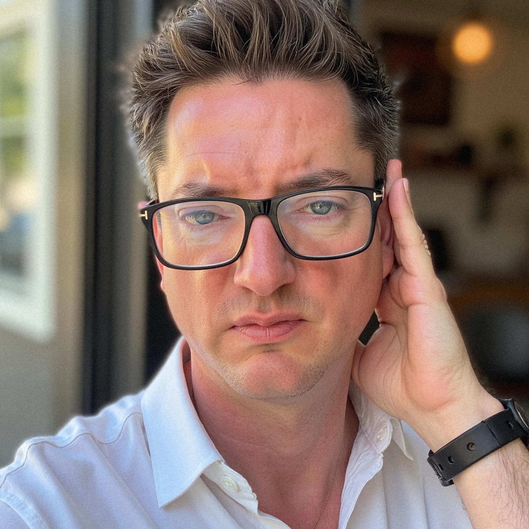 Professional headshot example: Man Office White Shirt Glasses — LinkedInHeadshots.ai