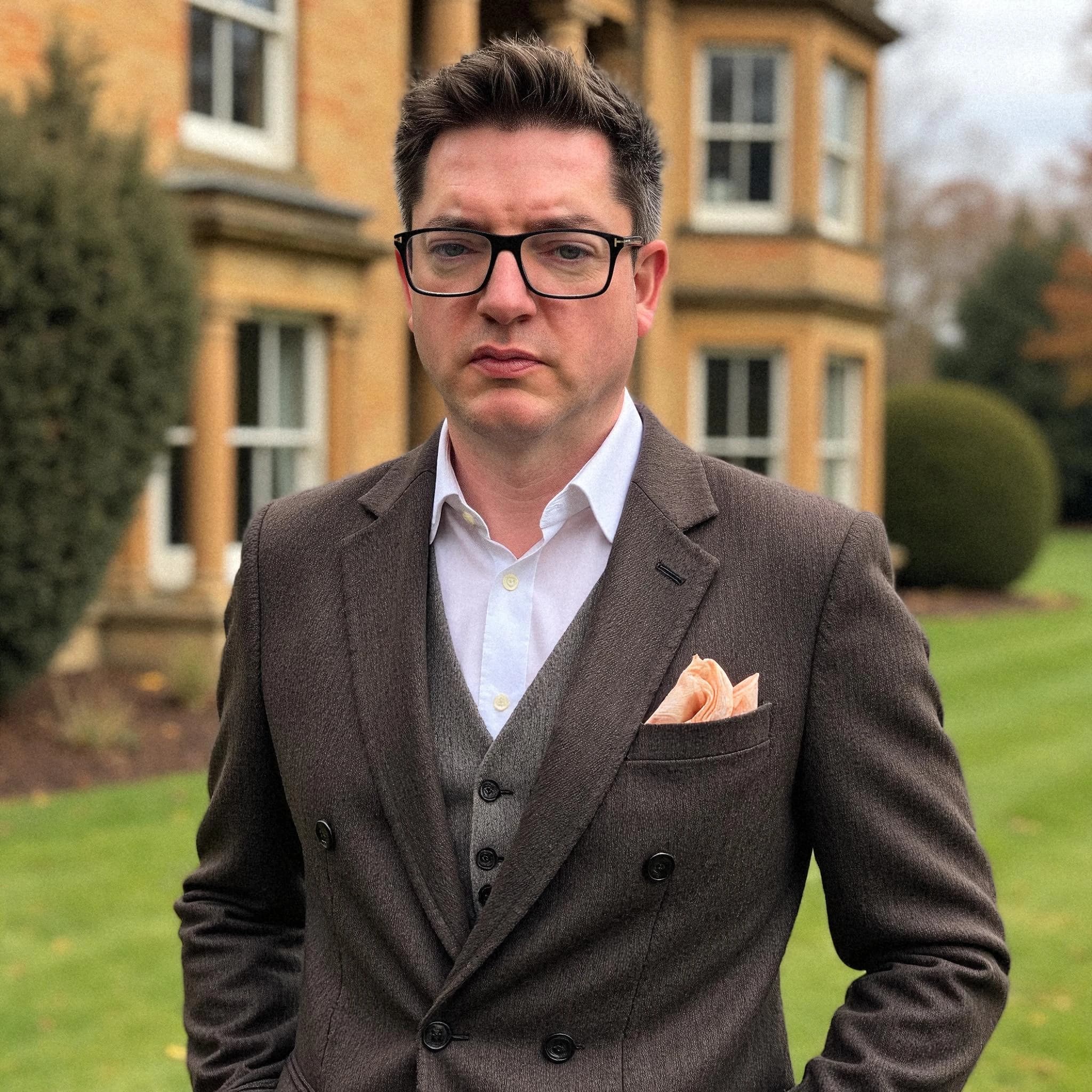 Professional headshot example: Man Outdoors Brown Suit Standing 3 — LinkedInHeadshots.ai