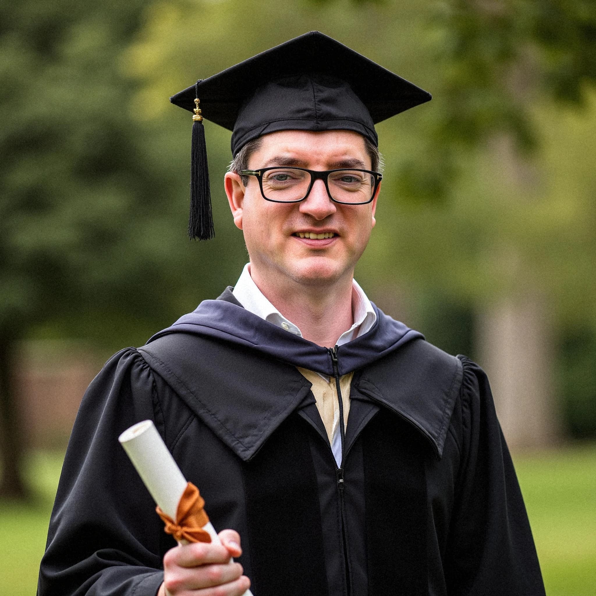Professional headshot example: Man Outdoors Graduation Gown Holding Diploma 3 — LinkedInHeadshots.ai