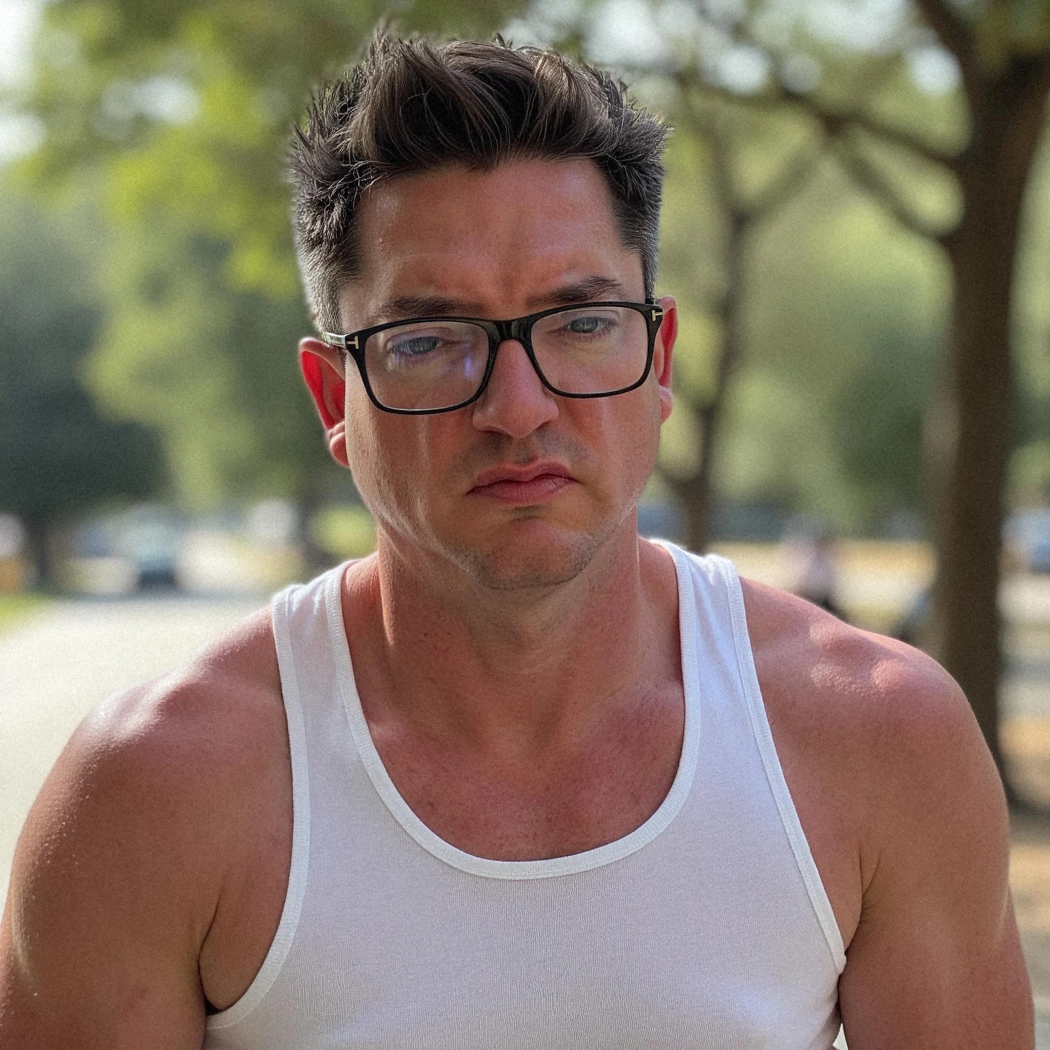 Professional headshot example: Man Outdoors White Tanktop Serious — LinkedInHeadshots.ai