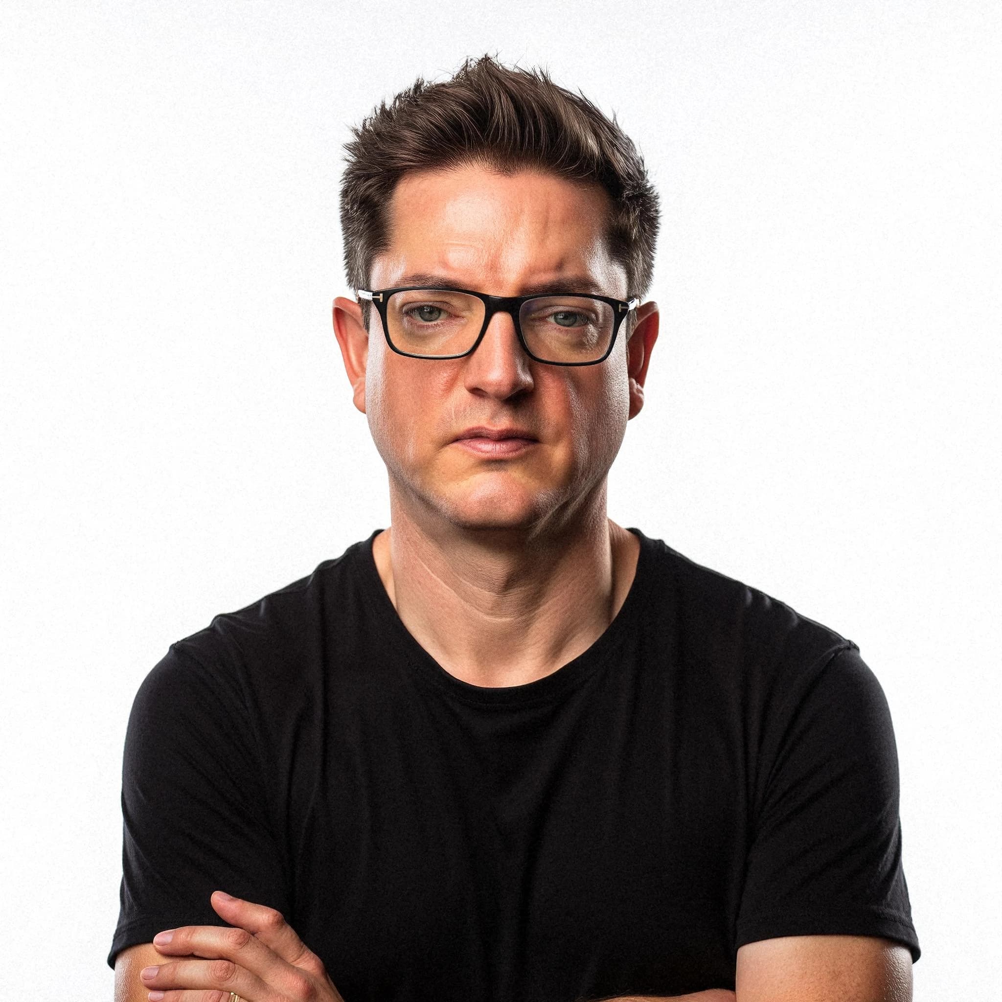 Professional headshot example: Man Studio Black Shirt Crossed Arms — LinkedInHeadshots.ai