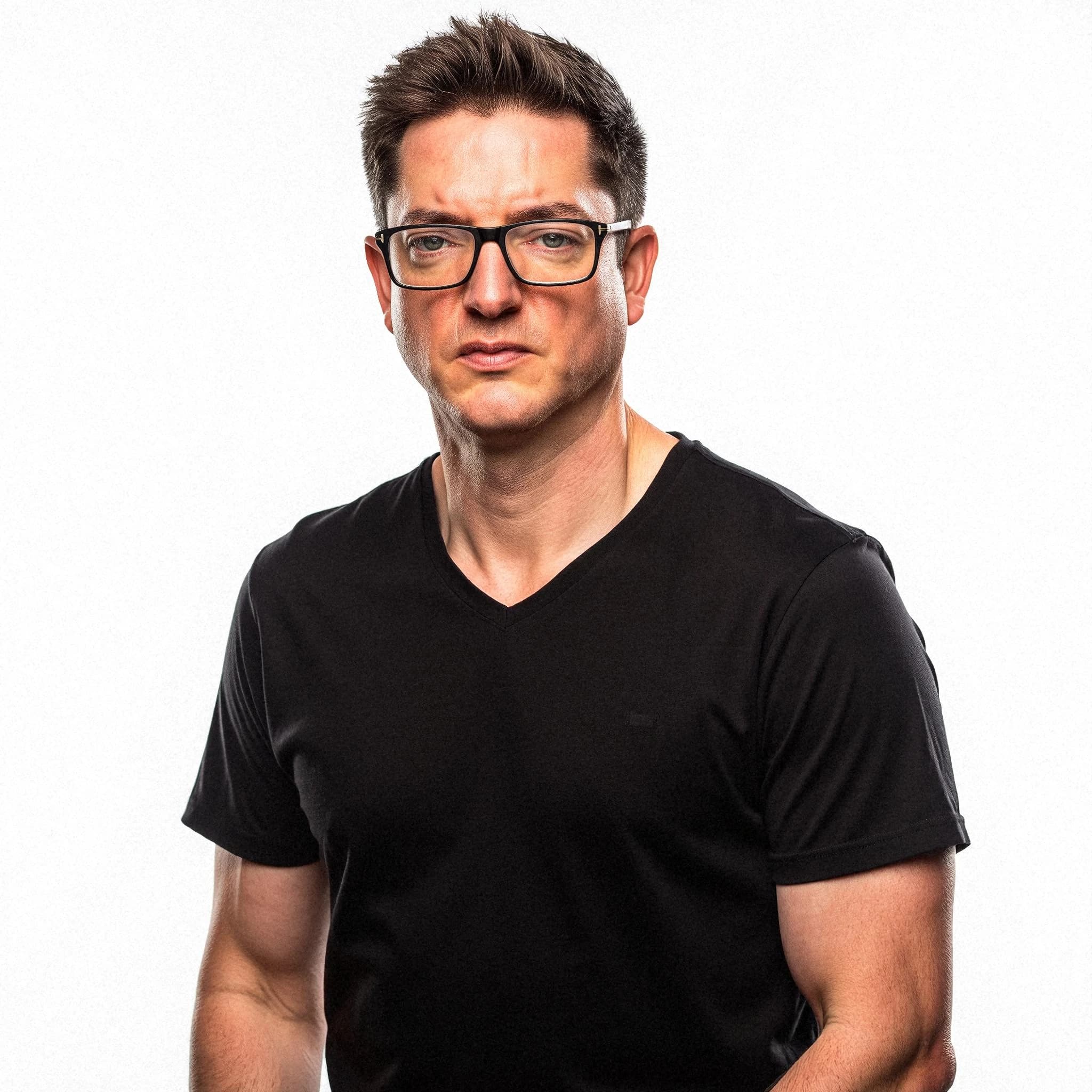 Professional headshot example: Man Studio Black Shirt Glasses 2 — LinkedInHeadshots.ai
