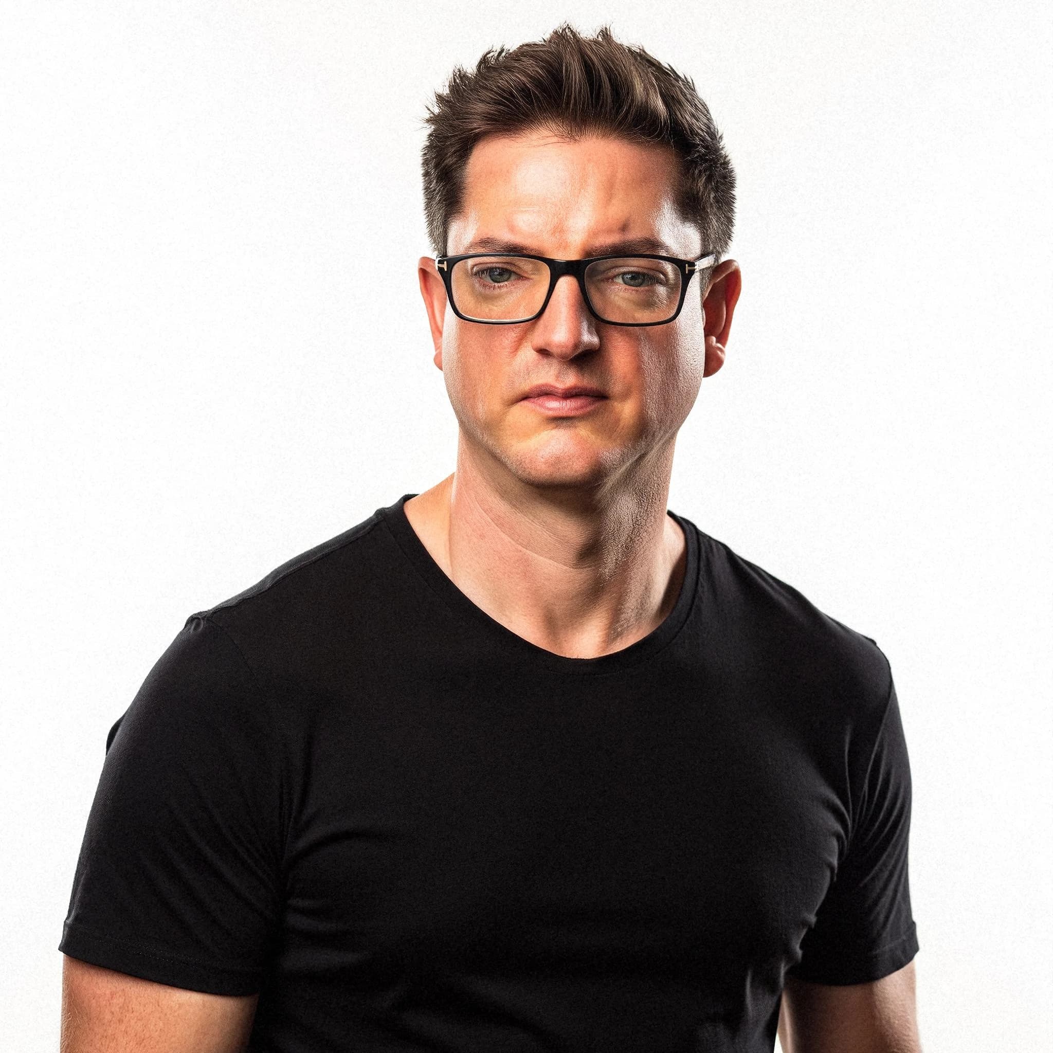 Professional headshot example: Man Studio Black Shirt Glasses 3 — LinkedInHeadshots.ai