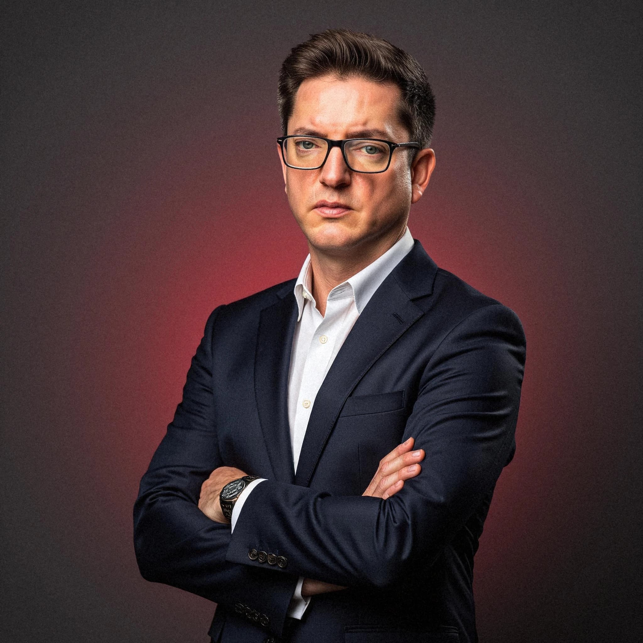 Professional headshot example: Man Studio Suit Crossed Arms 6 — LinkedInHeadshots.ai