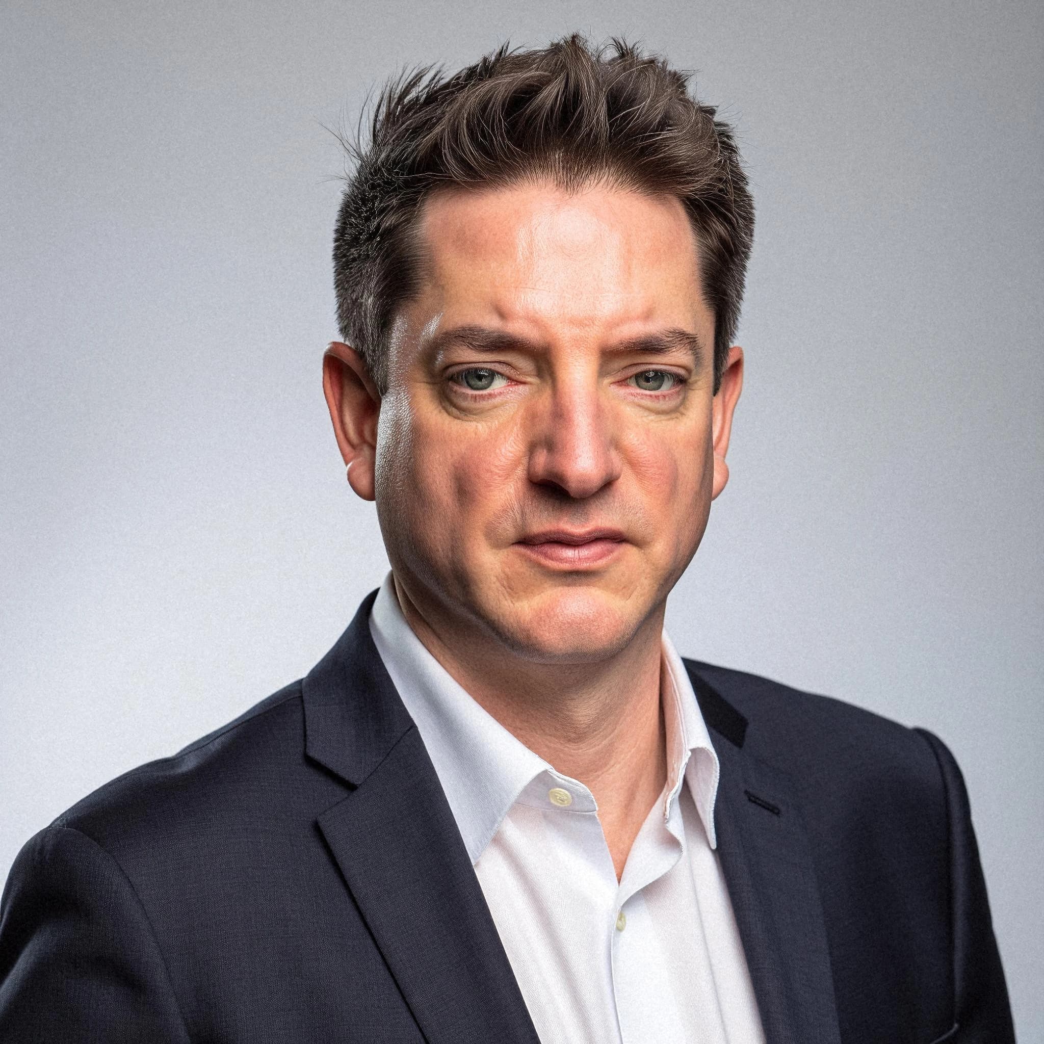 Professional headshot example: Man Studio Suit Headshot — LinkedInHeadshots.ai