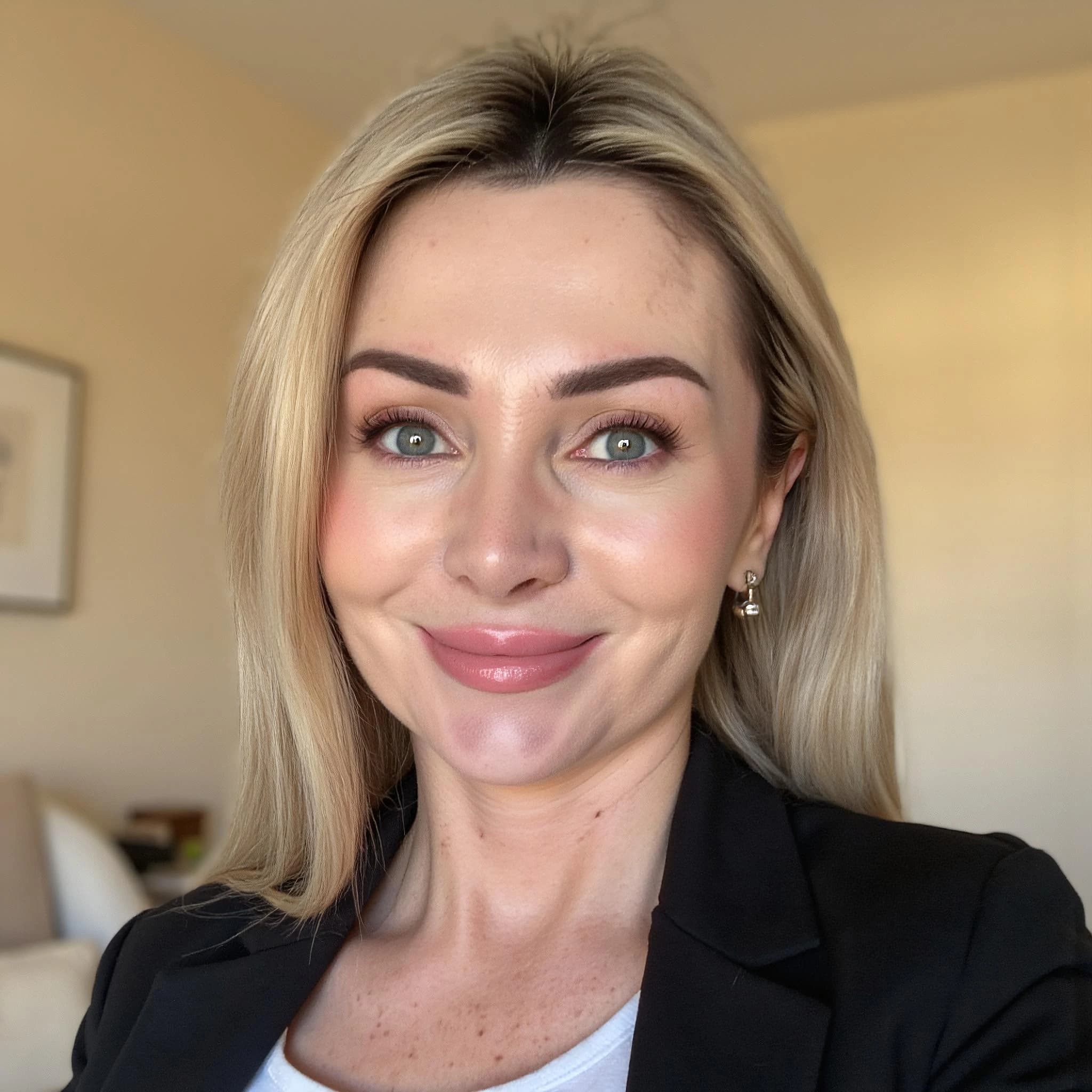 Professional headshot example: Woman Home Black Blazer Smiling 2 — LinkedInHeadshots.ai