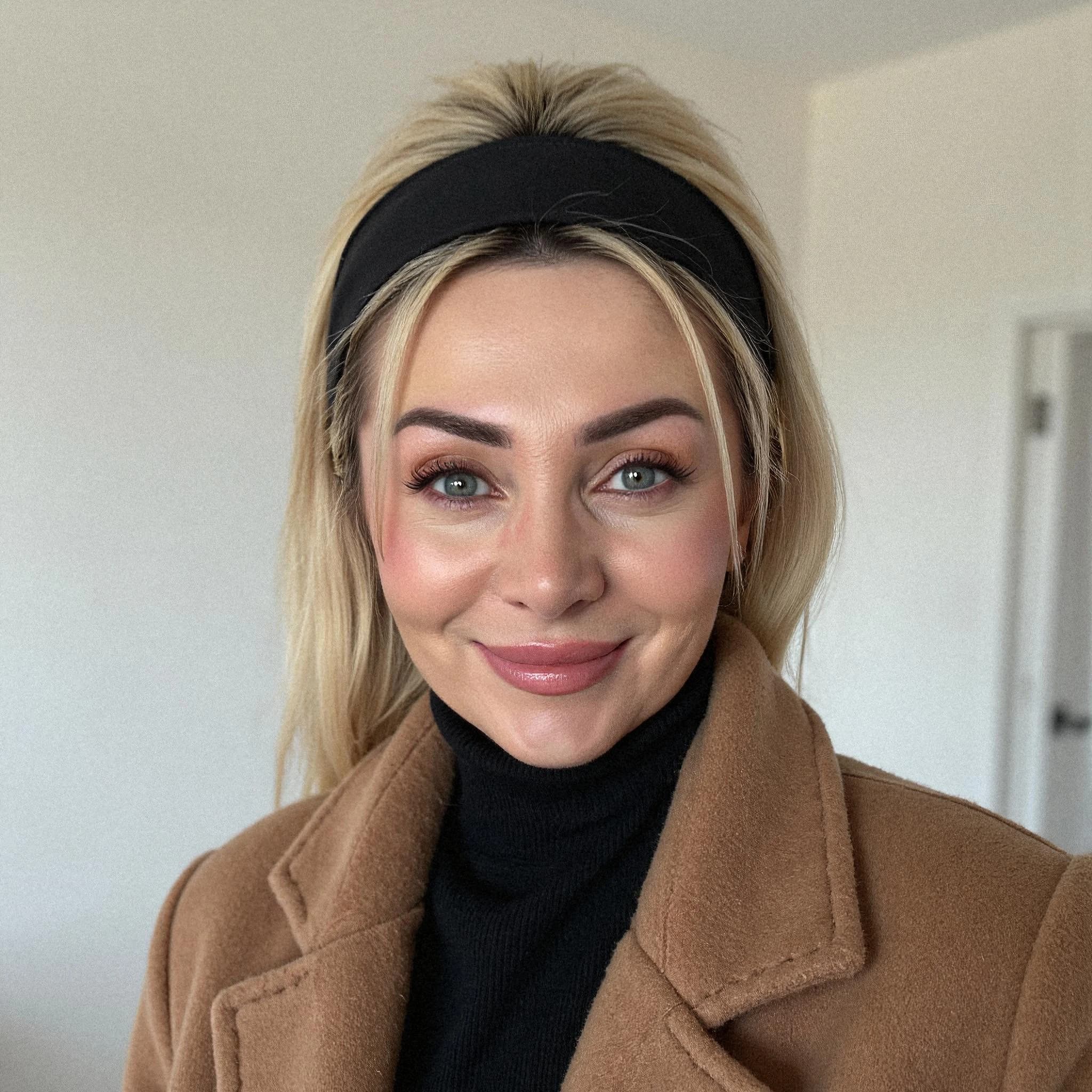 Professional headshot example: Woman Home Brown Coat Smiling 2 — LinkedInHeadshots.ai