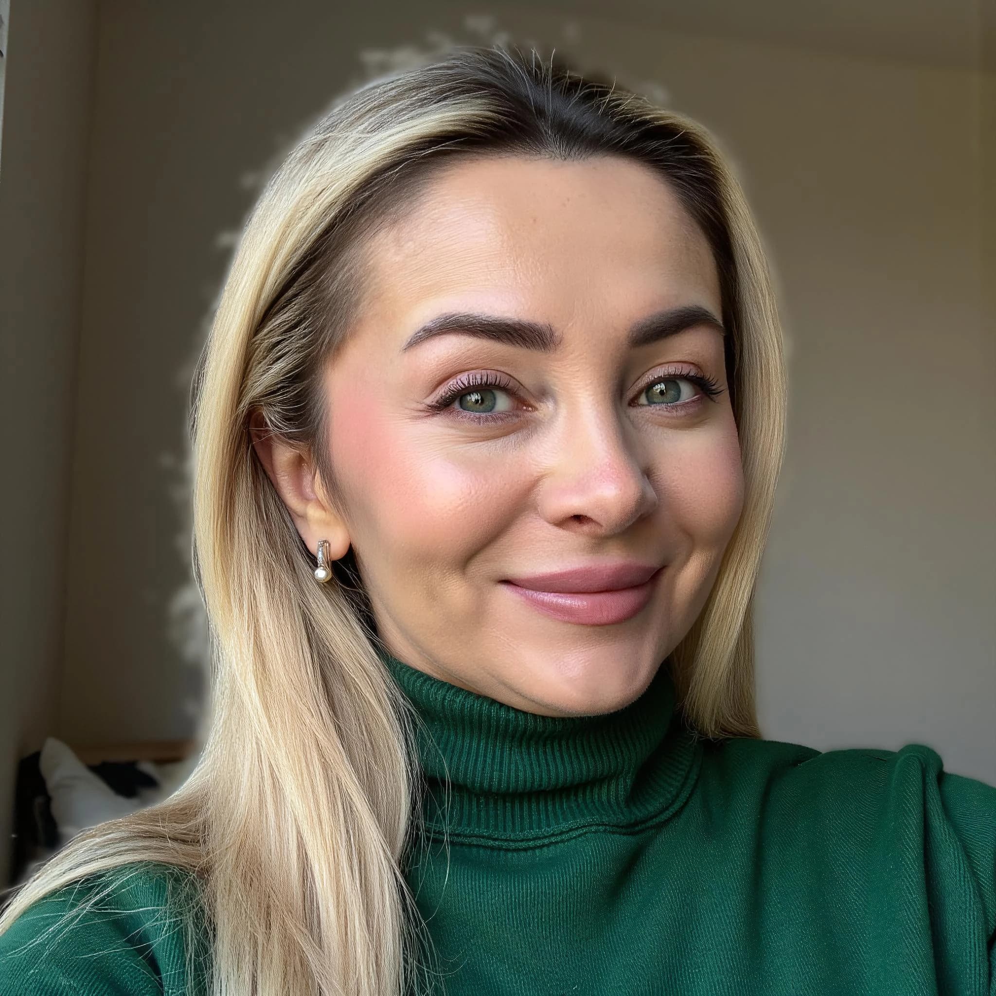 Professional headshot example: Woman Home Green Sweater Smiling 3 — LinkedInHeadshots.ai
