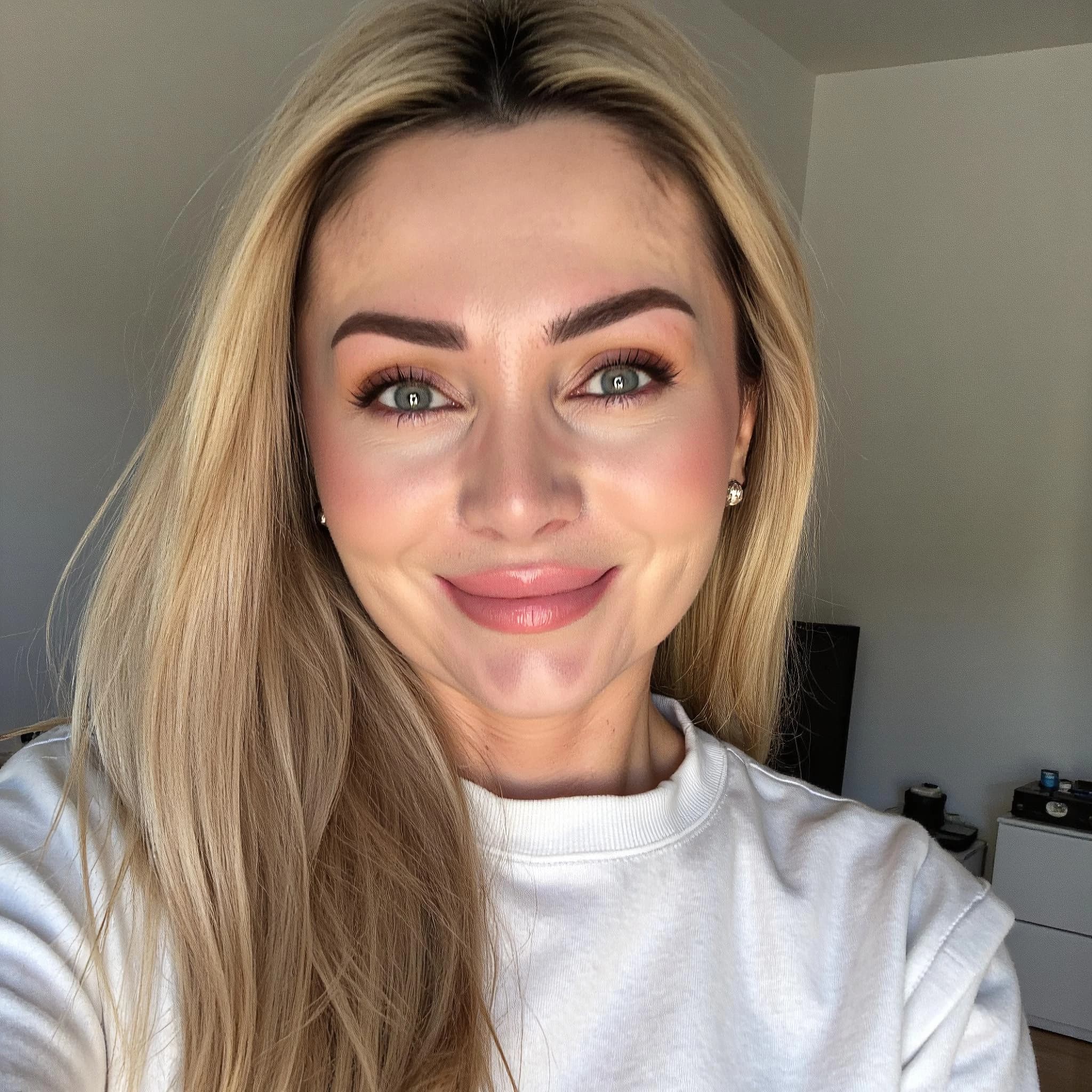 Professional headshot example: Woman Home White Shirt Smiling 4 — LinkedInHeadshots.ai