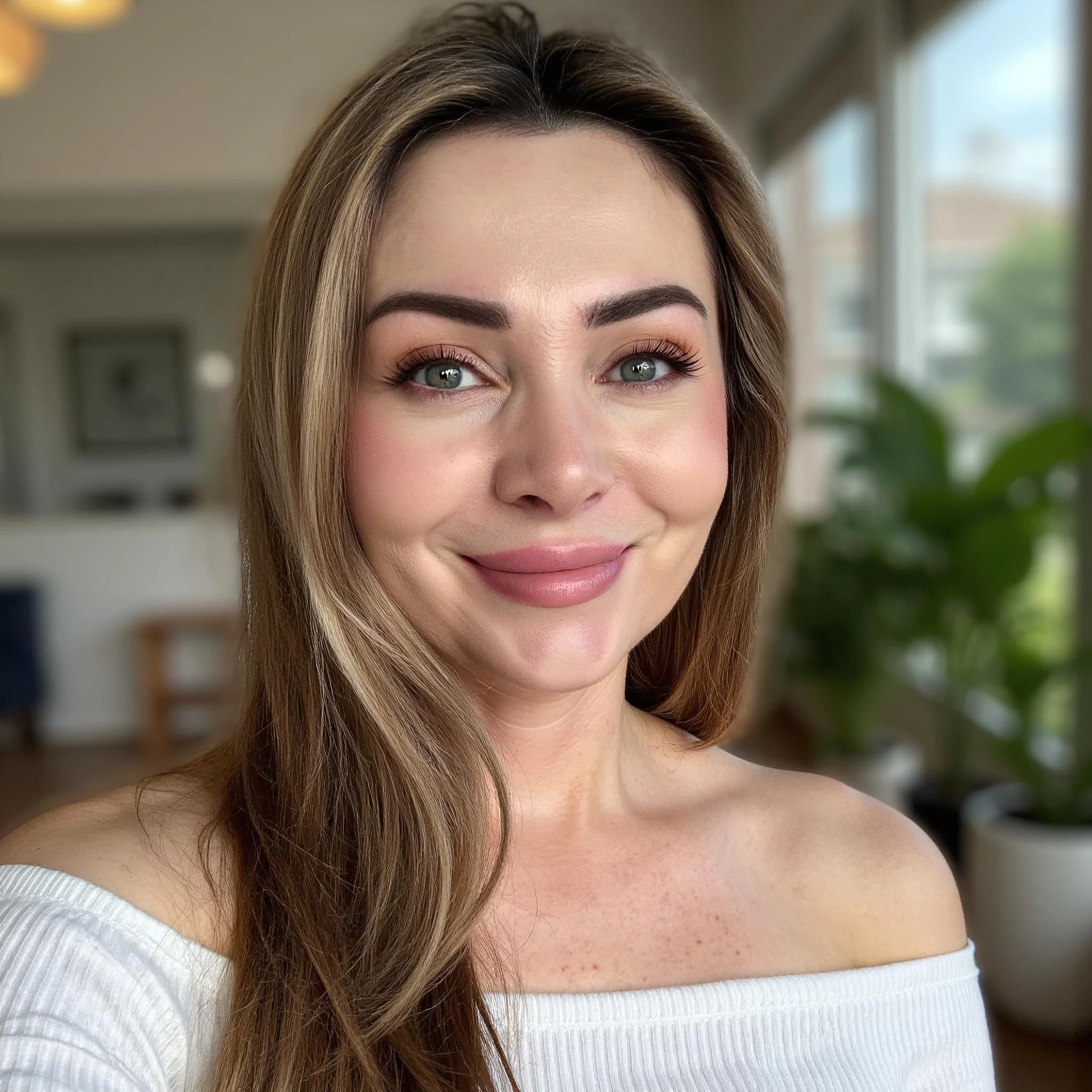 Professional headshot example: Woman Home White Top Smiling 2 — LinkedInHeadshots.ai
