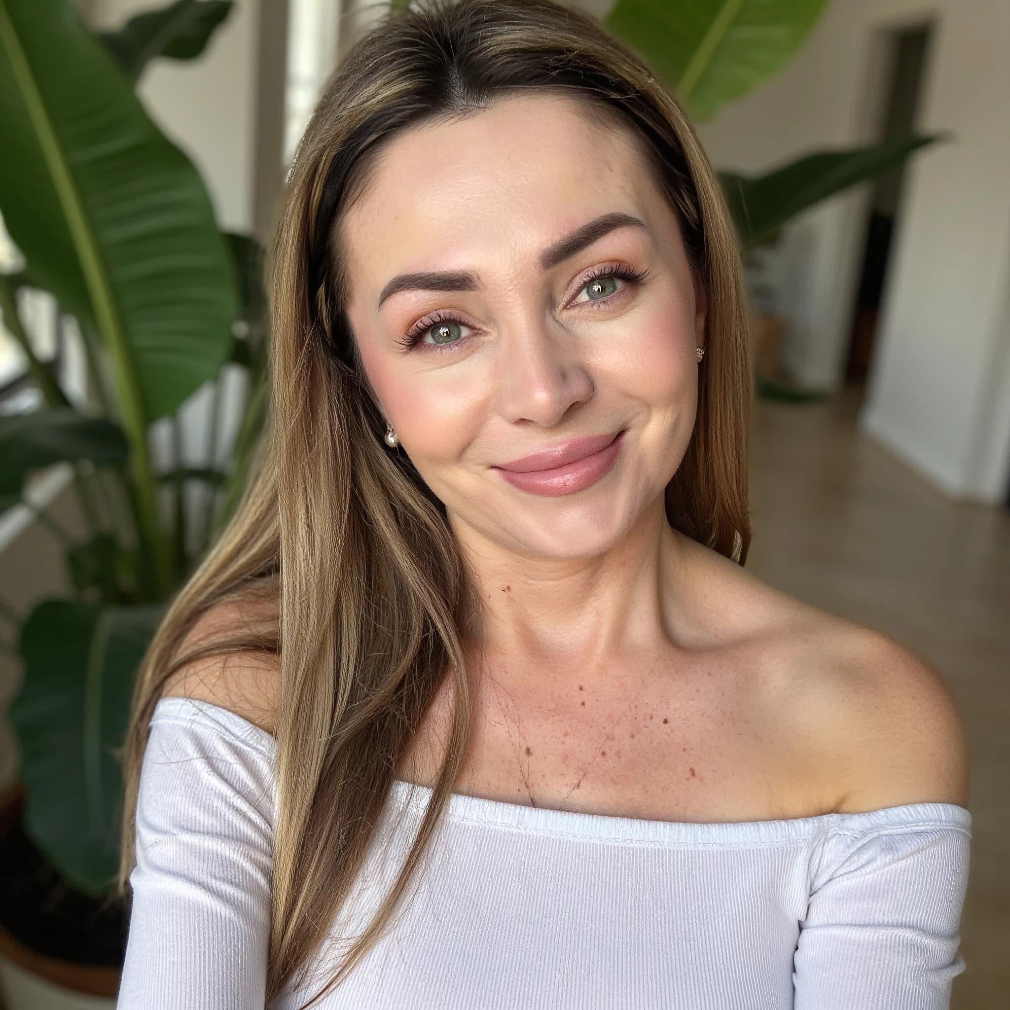 Professional headshot example: Woman Home White Top Smiling 3 — LinkedInHeadshots.ai