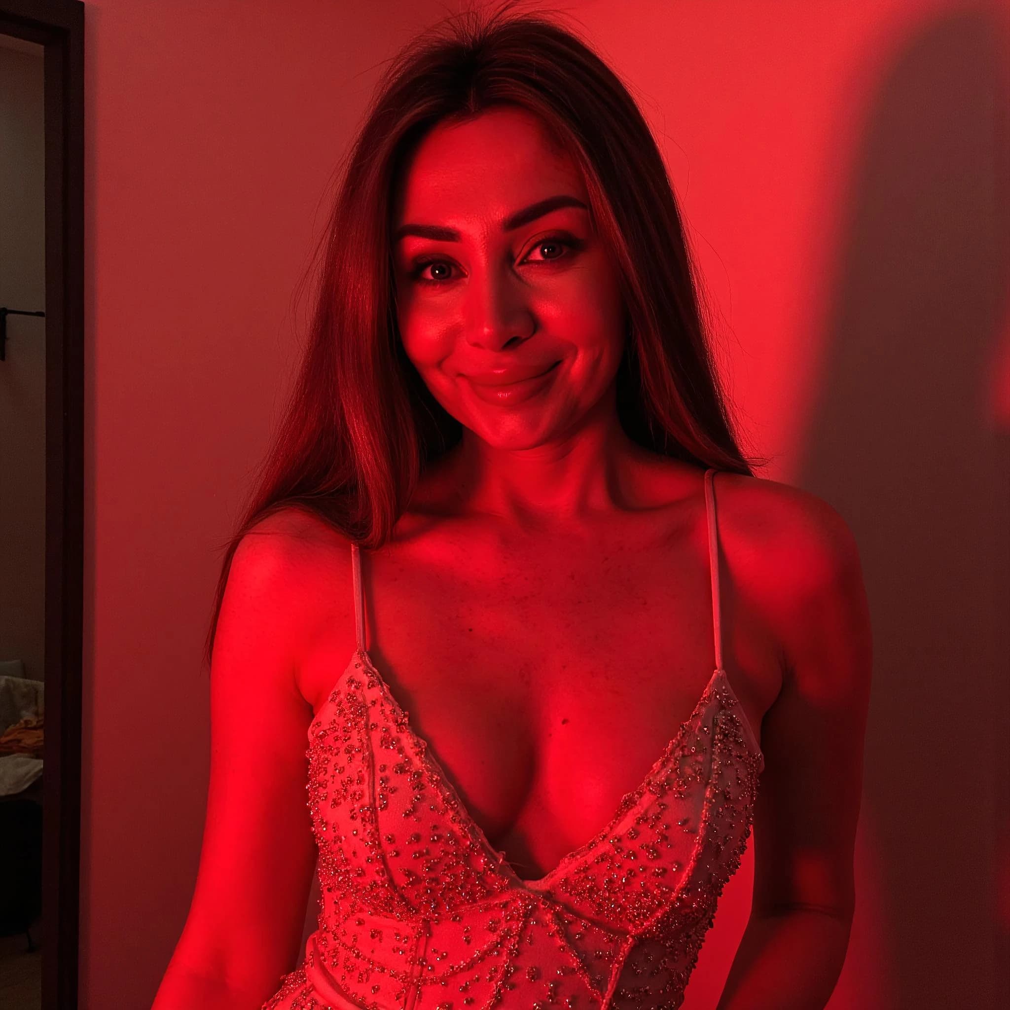 Professional headshot example: Woman Indoor Beaded Dress Smiling — LinkedInHeadshots.ai