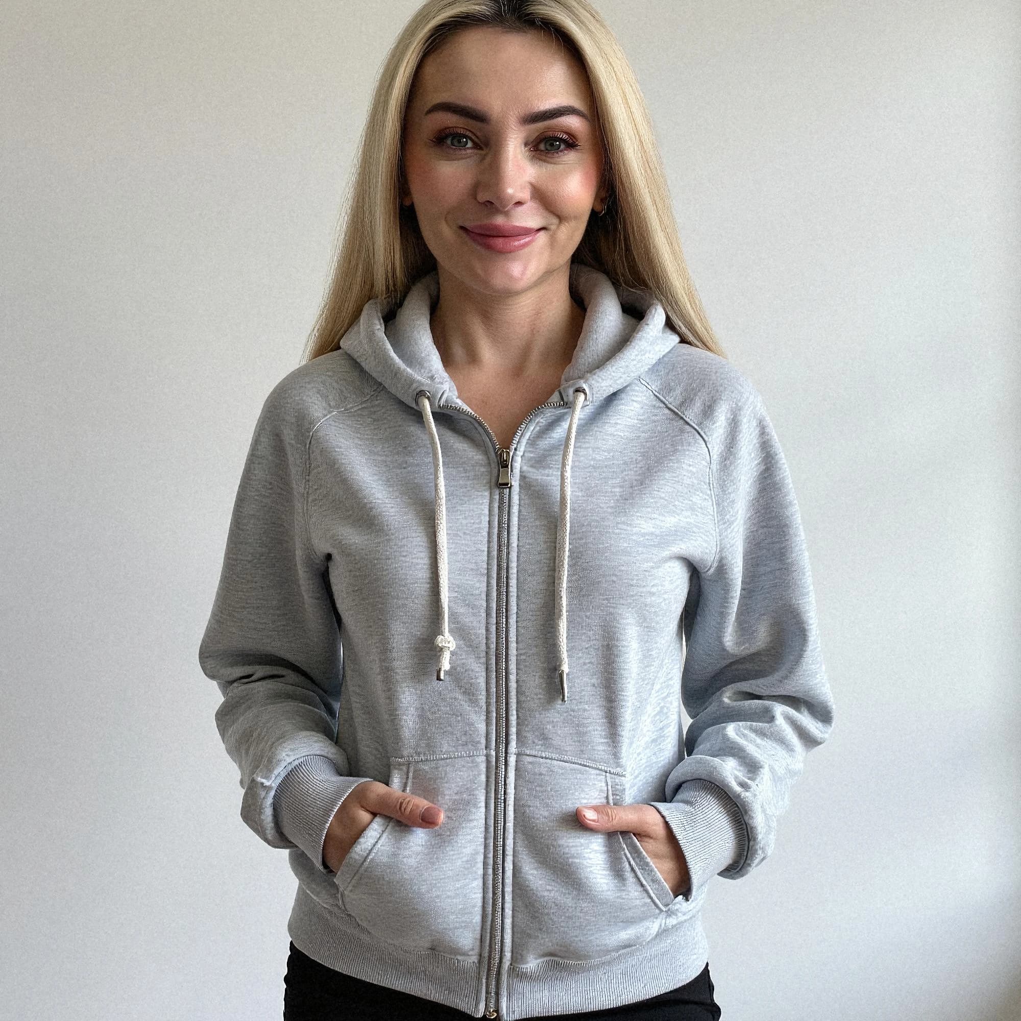 Professional headshot example: Woman Indoor Grey Hoodie Smiling 2 — LinkedInHeadshots.ai