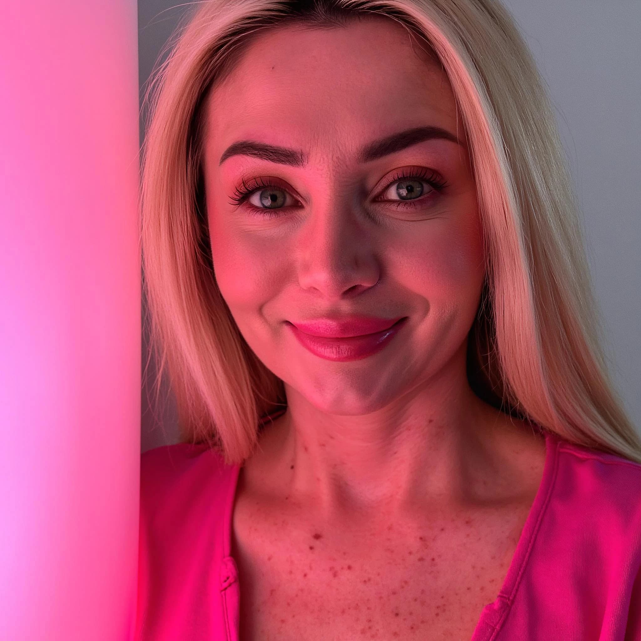 Professional headshot example: Woman Indoor Pink Top Smiling 4 — LinkedInHeadshots.ai
