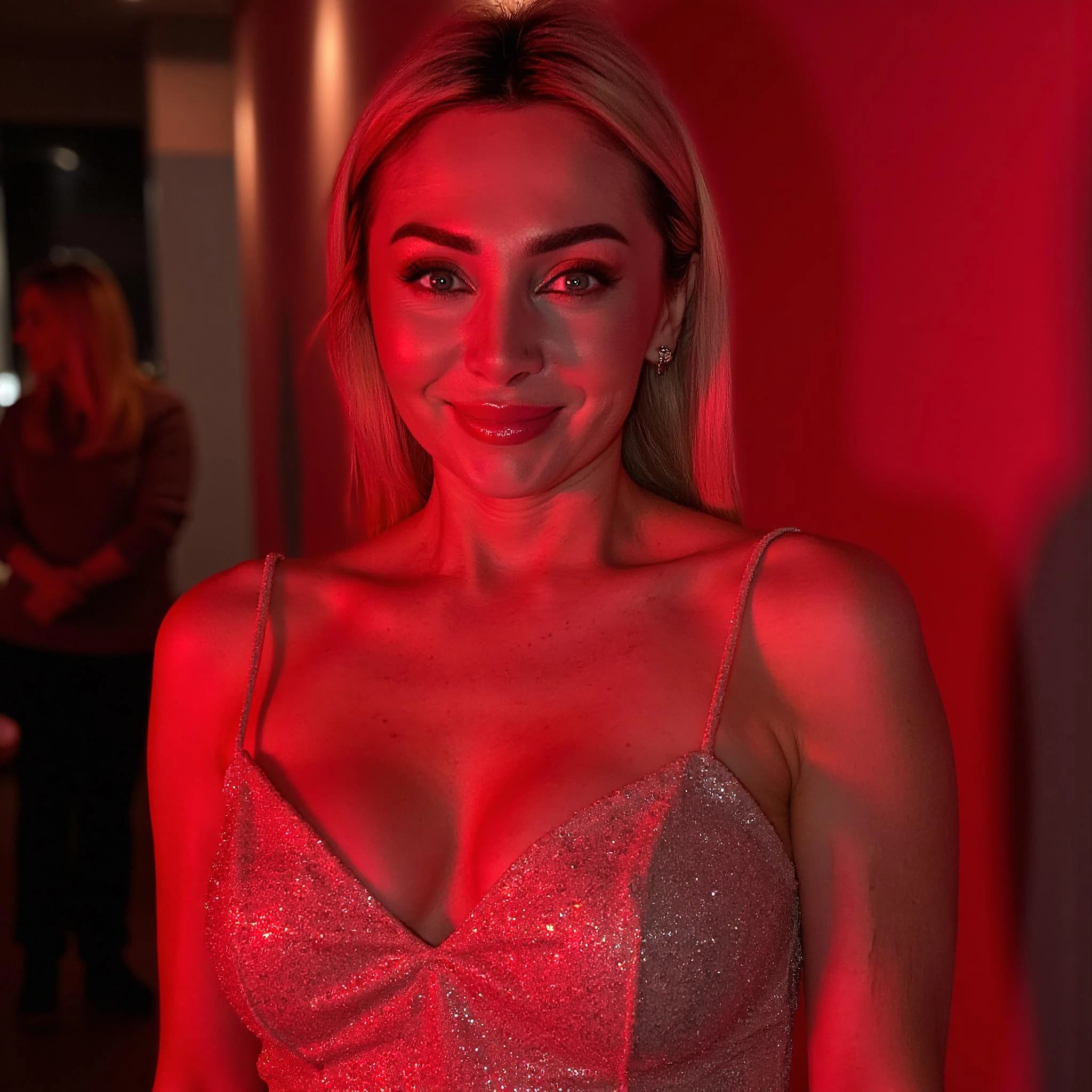 Professional headshot example: Woman Indoor Sparkly Dress Smiling — LinkedInHeadshots.ai