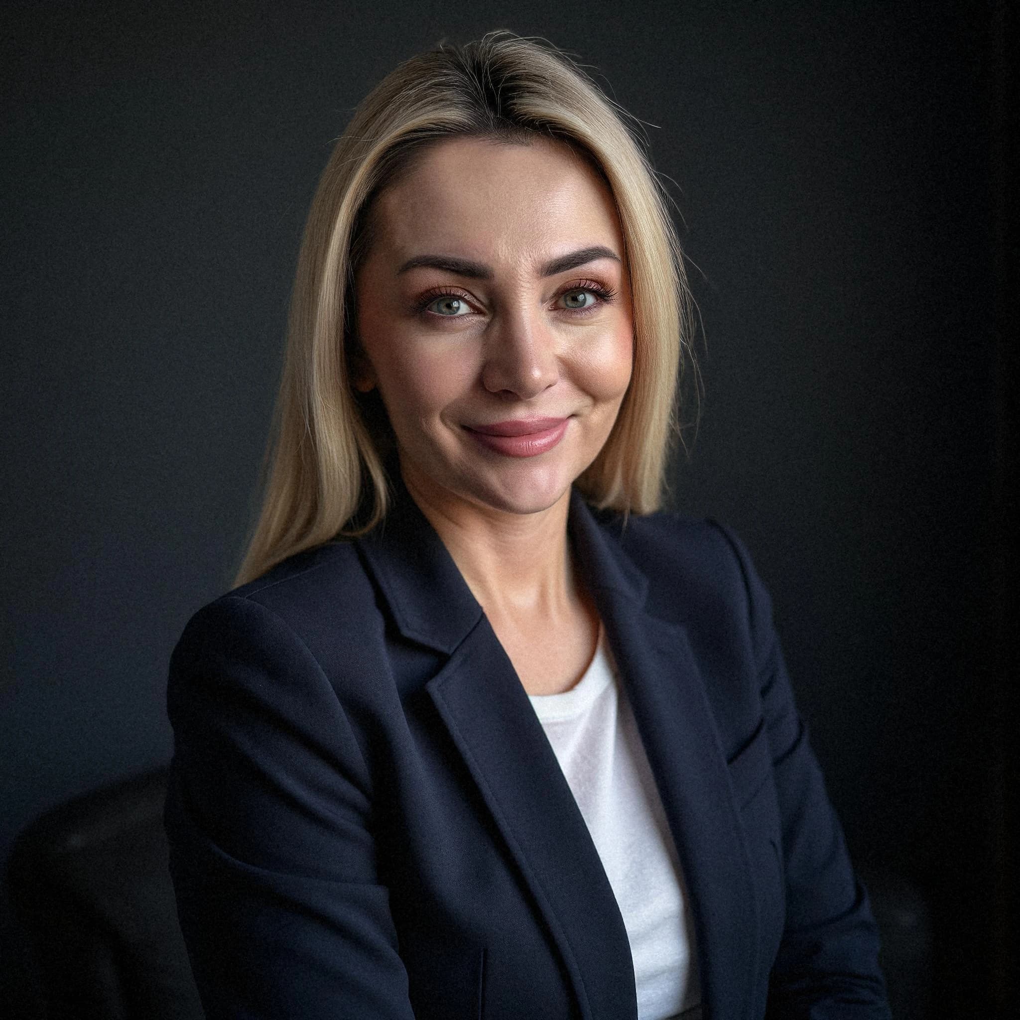 Professional headshot example: Woman Office Black Blazer Smiling 12 — LinkedInHeadshots.ai