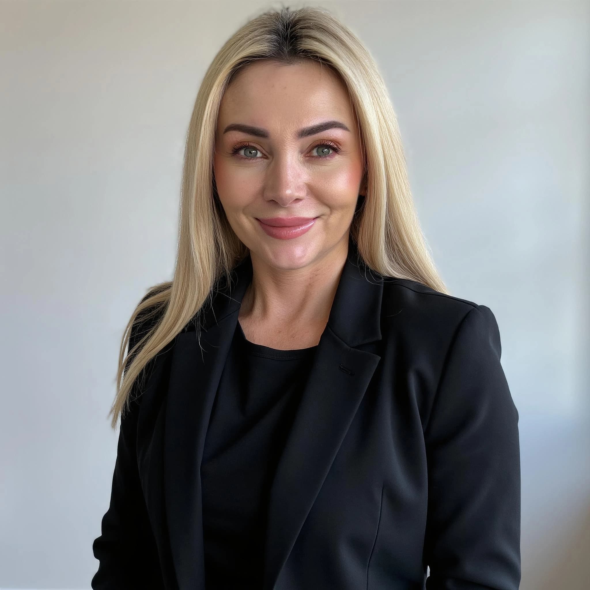 Professional headshot example: Woman Office Black Blazer Smiling 13 — LinkedInHeadshots.ai