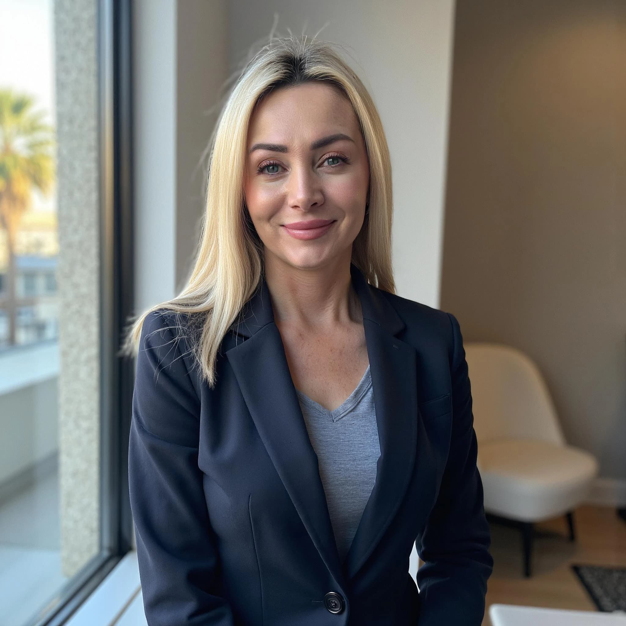 Professional headshot example: Woman Office Black Blazer Smiling 25 — LinkedInHeadshots.ai