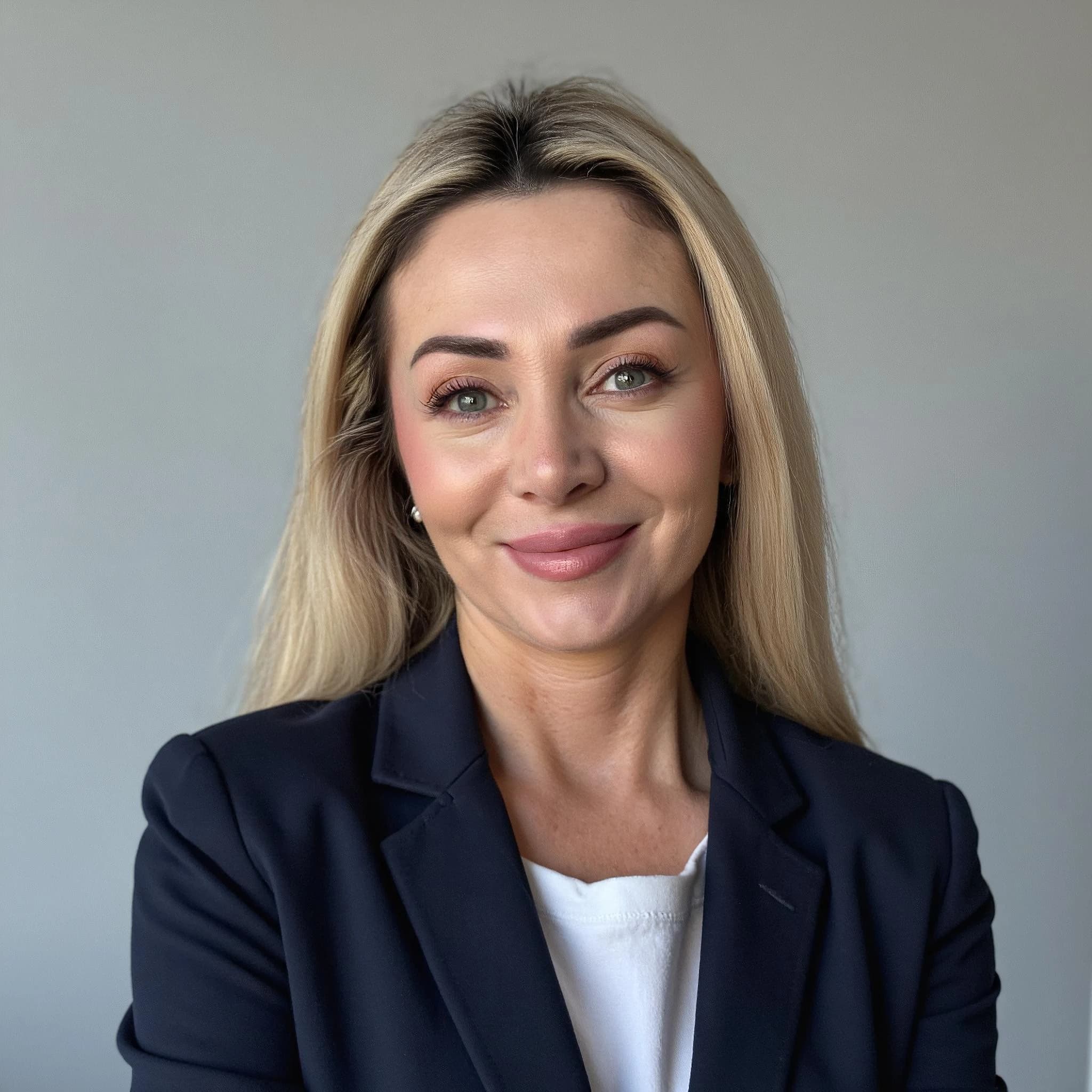 Professional headshot example: Woman Office Black Blazer Smiling 30 — LinkedInHeadshots.ai