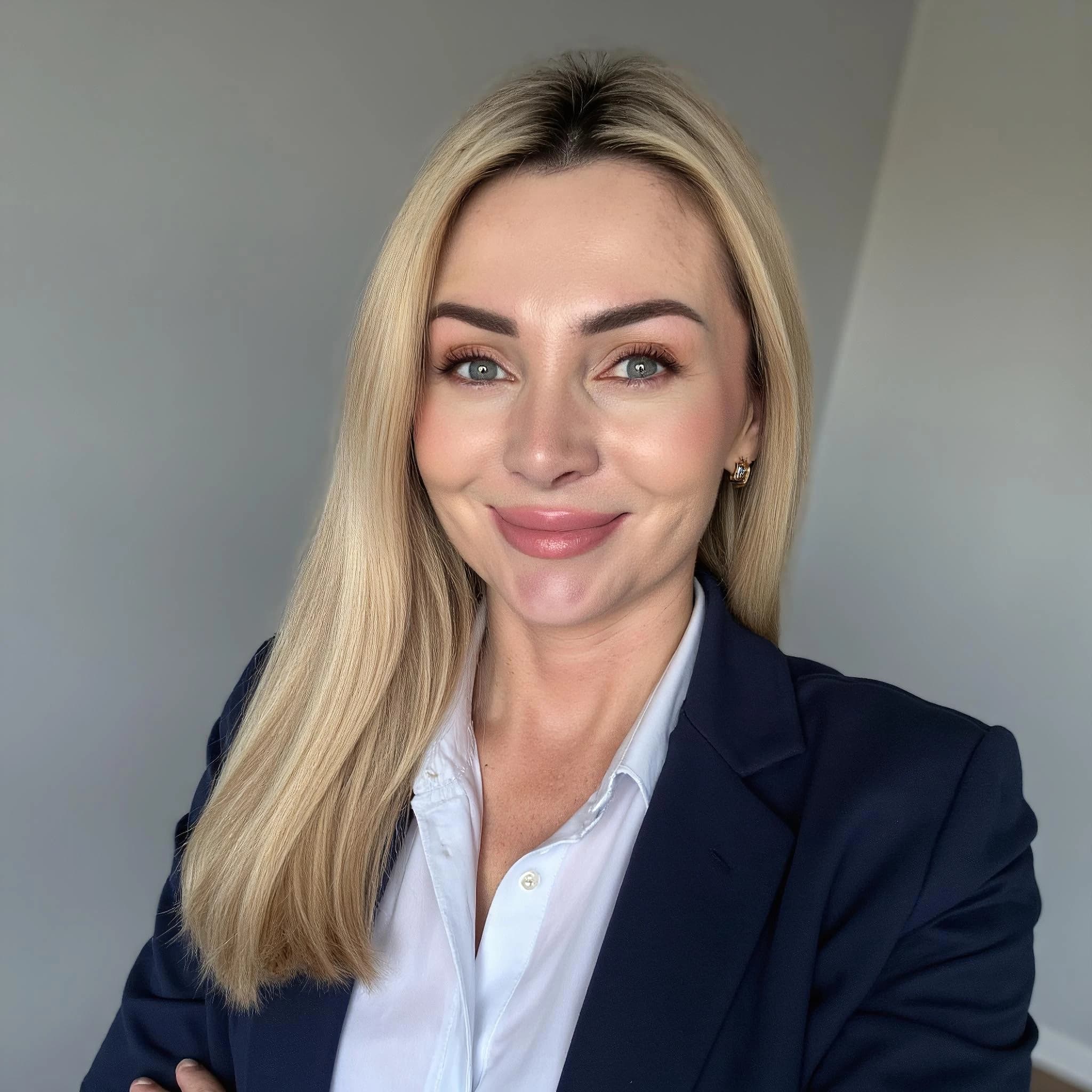 Professional headshot example: Woman Office Blue Blazer Smiling — LinkedInHeadshots.ai
