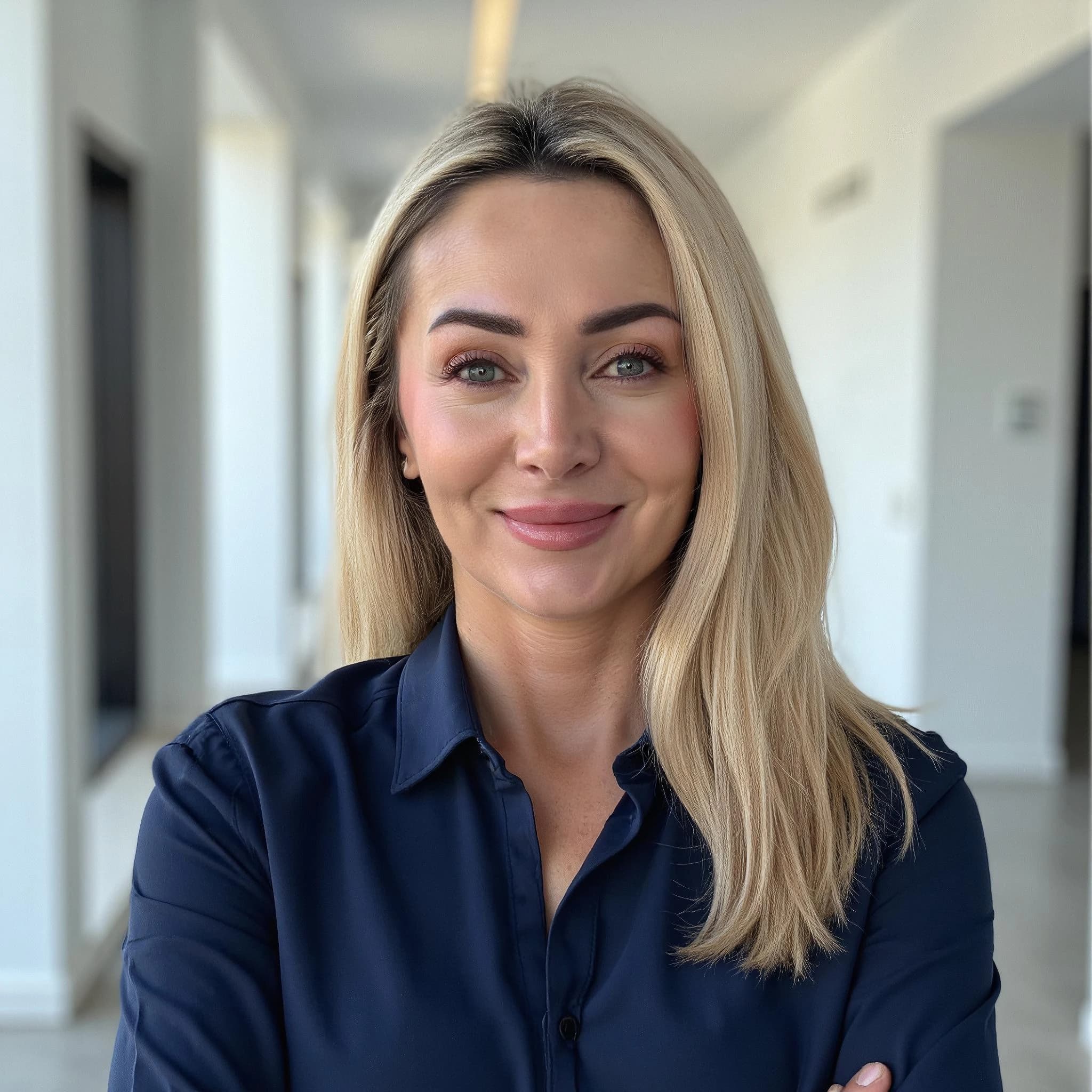 Professional headshot example: Woman Office Blue Shirt Smiling 2 — LinkedInHeadshots.ai