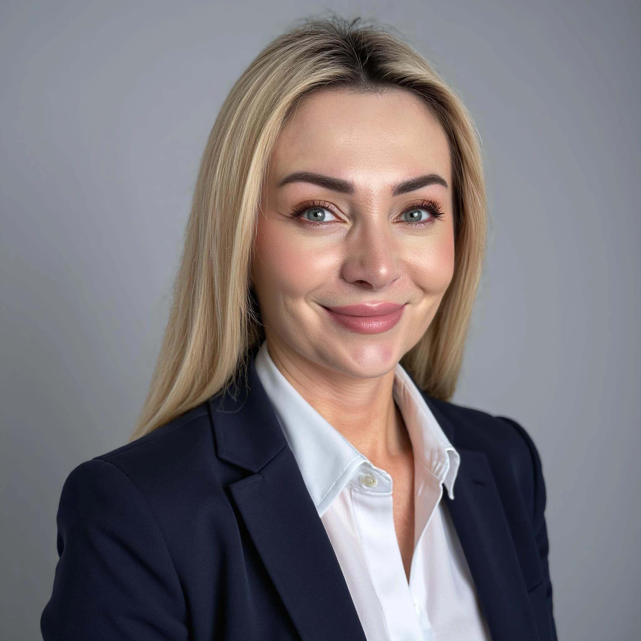 Professional headshot example: Woman Office Suit Smiling Headshot — LinkedInHeadshots.ai