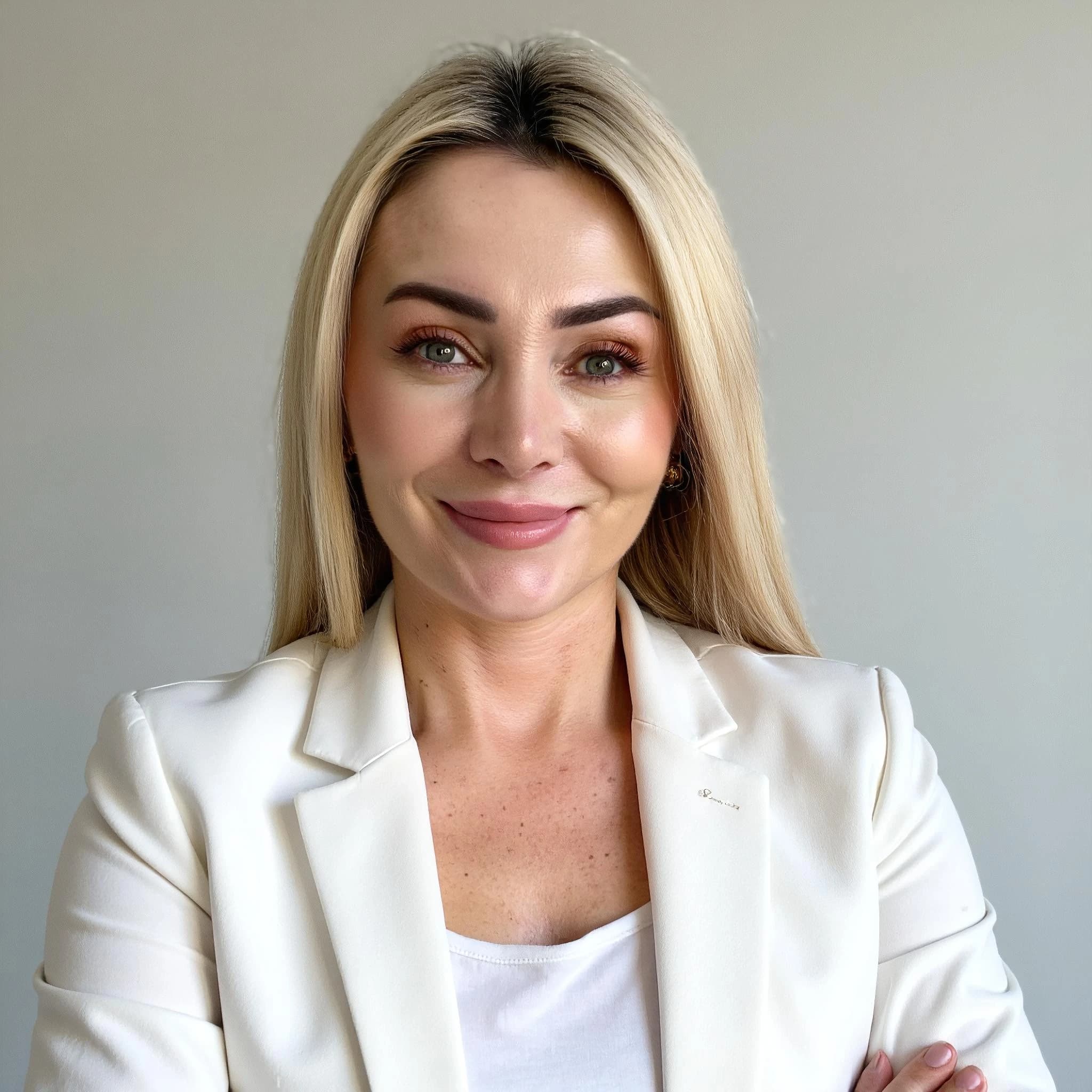 Professional headshot example: Woman Office White Blazer Smiling 4 — LinkedInHeadshots.ai