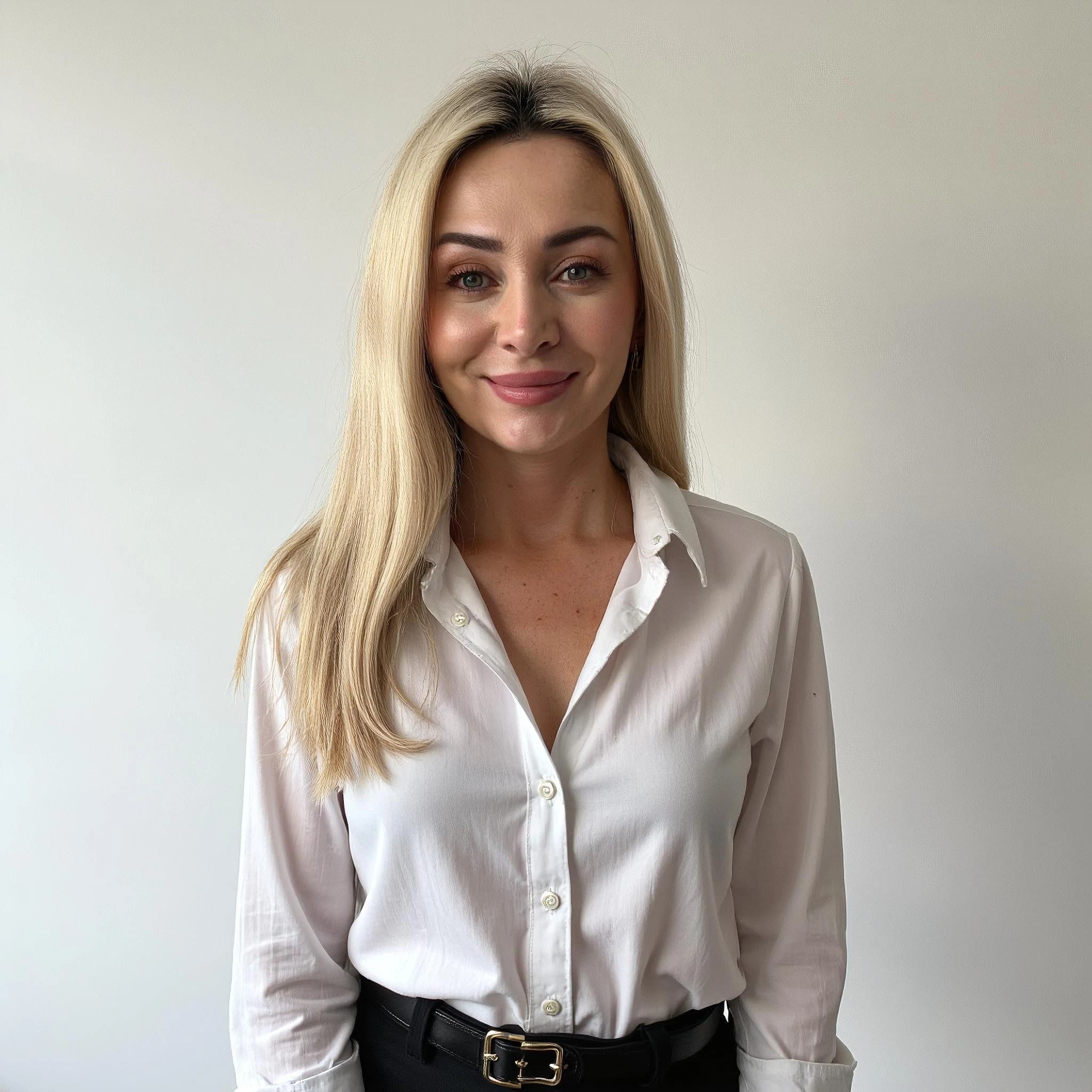 Professional headshot example: Woman Office White Shirt Smiling — LinkedInHeadshots.ai