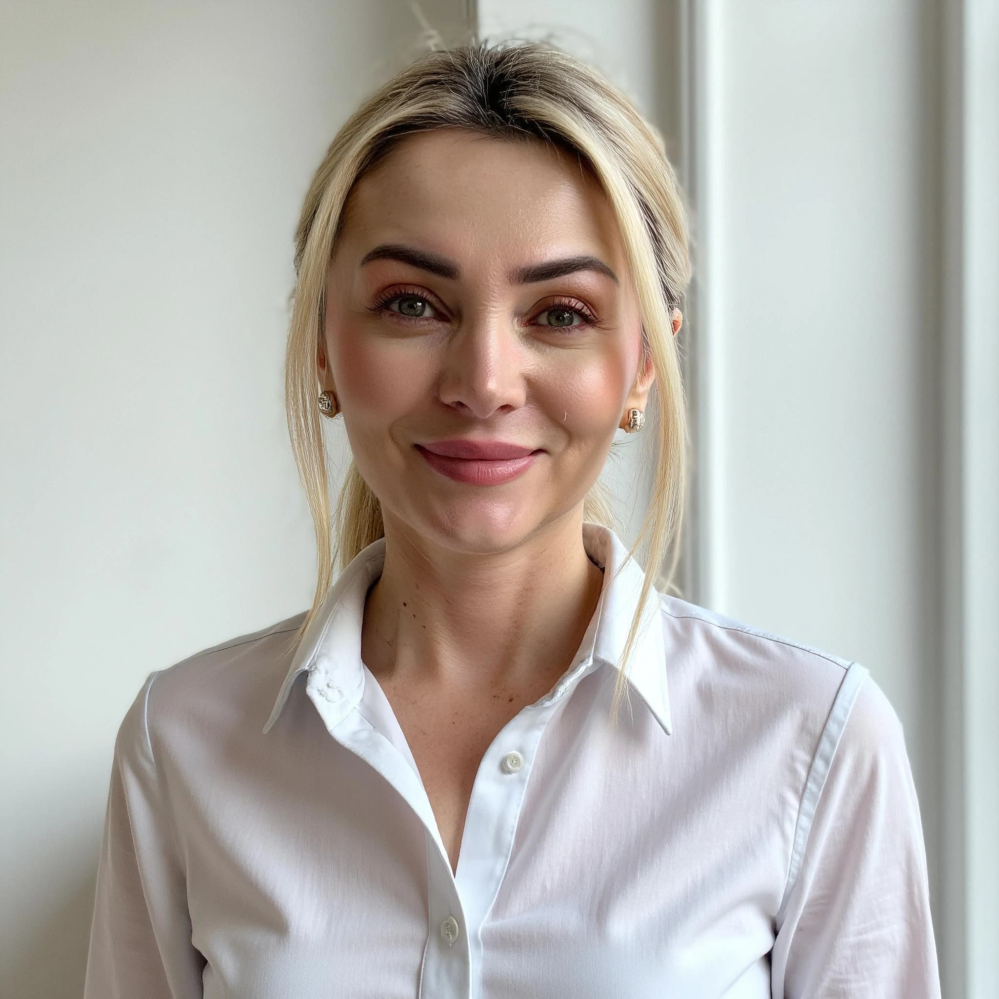 Professional headshot example: Woman Office White Shirt Smiling 3 — LinkedInHeadshots.ai