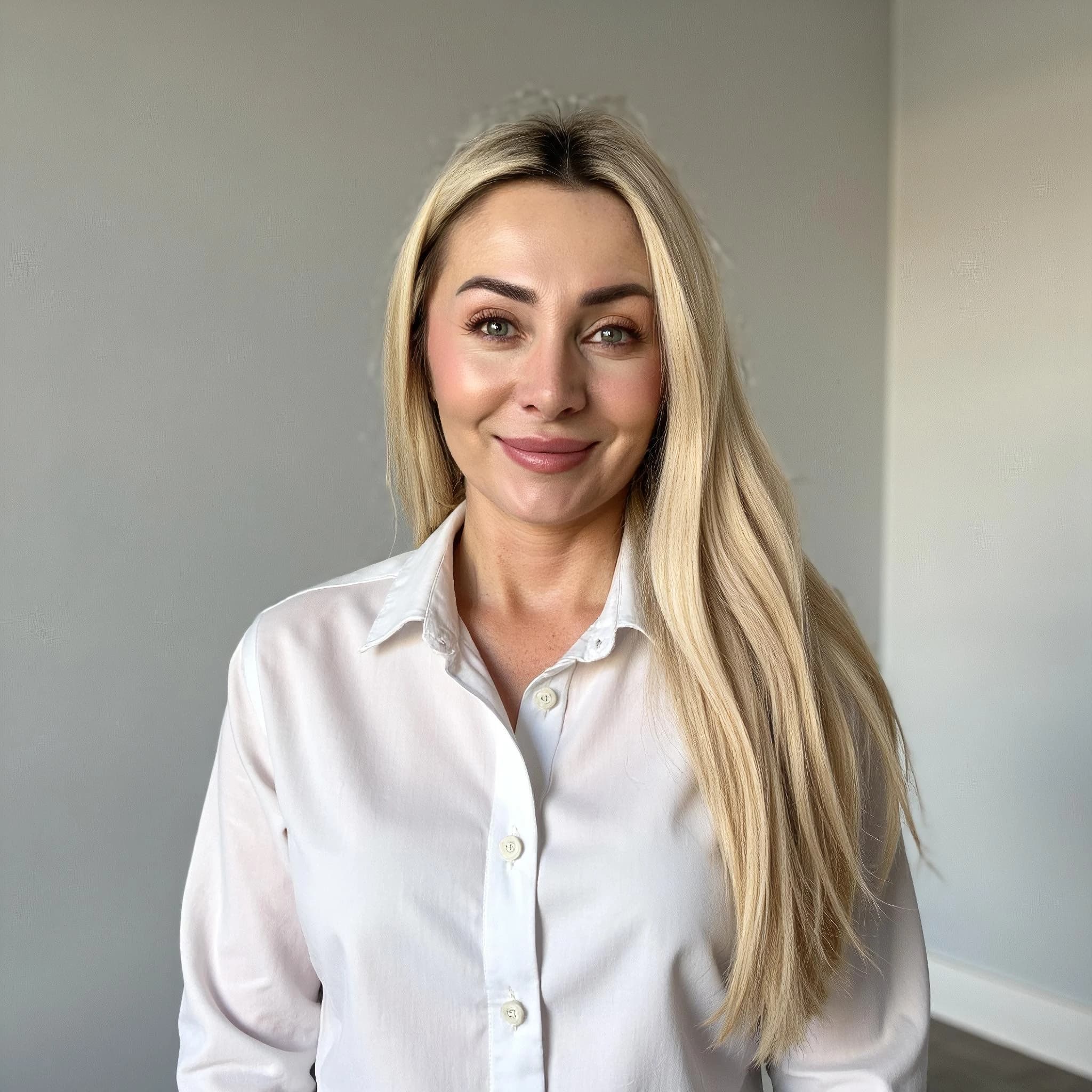 Professional headshot example: Woman Office White Shirt Smiling 9 — LinkedInHeadshots.ai