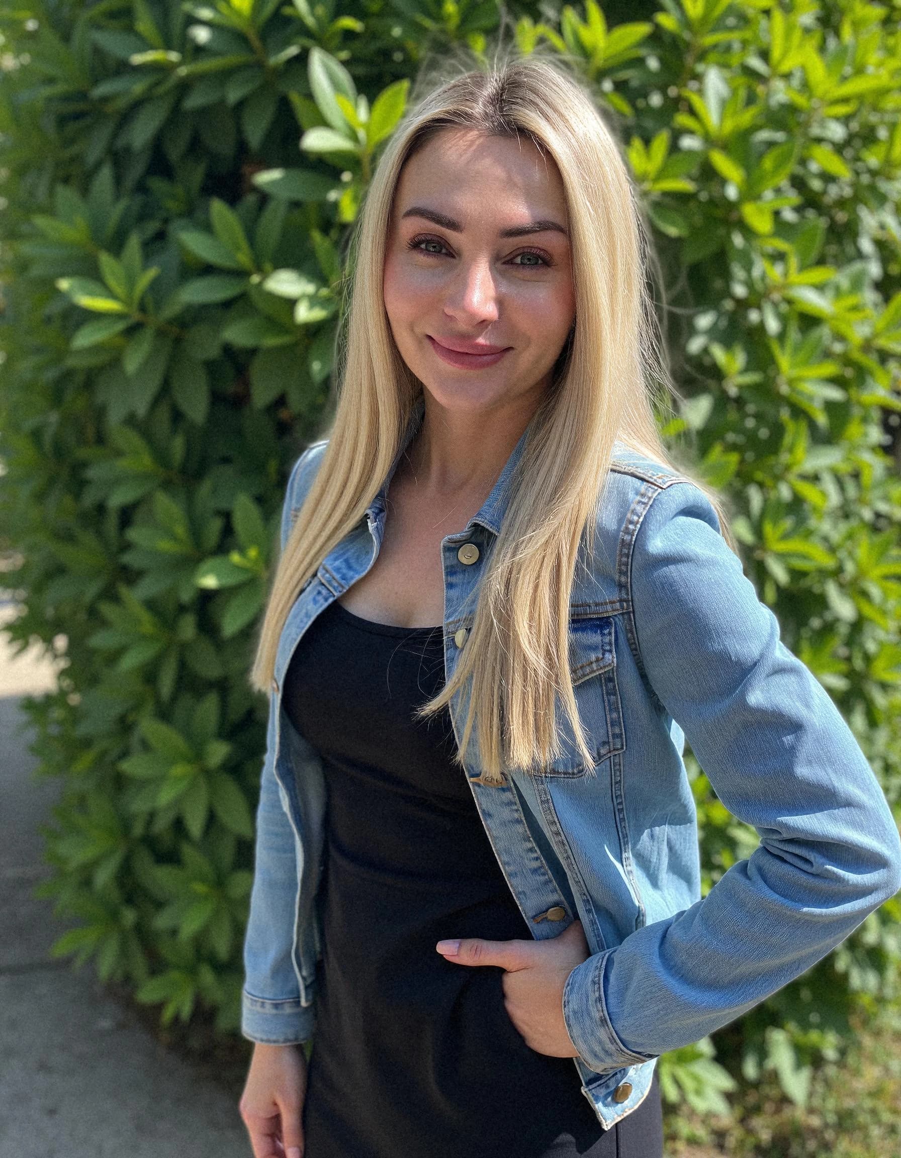 Professional headshot example: Woman Outdoors Denim Jacket Smiling — LinkedInHeadshots.ai