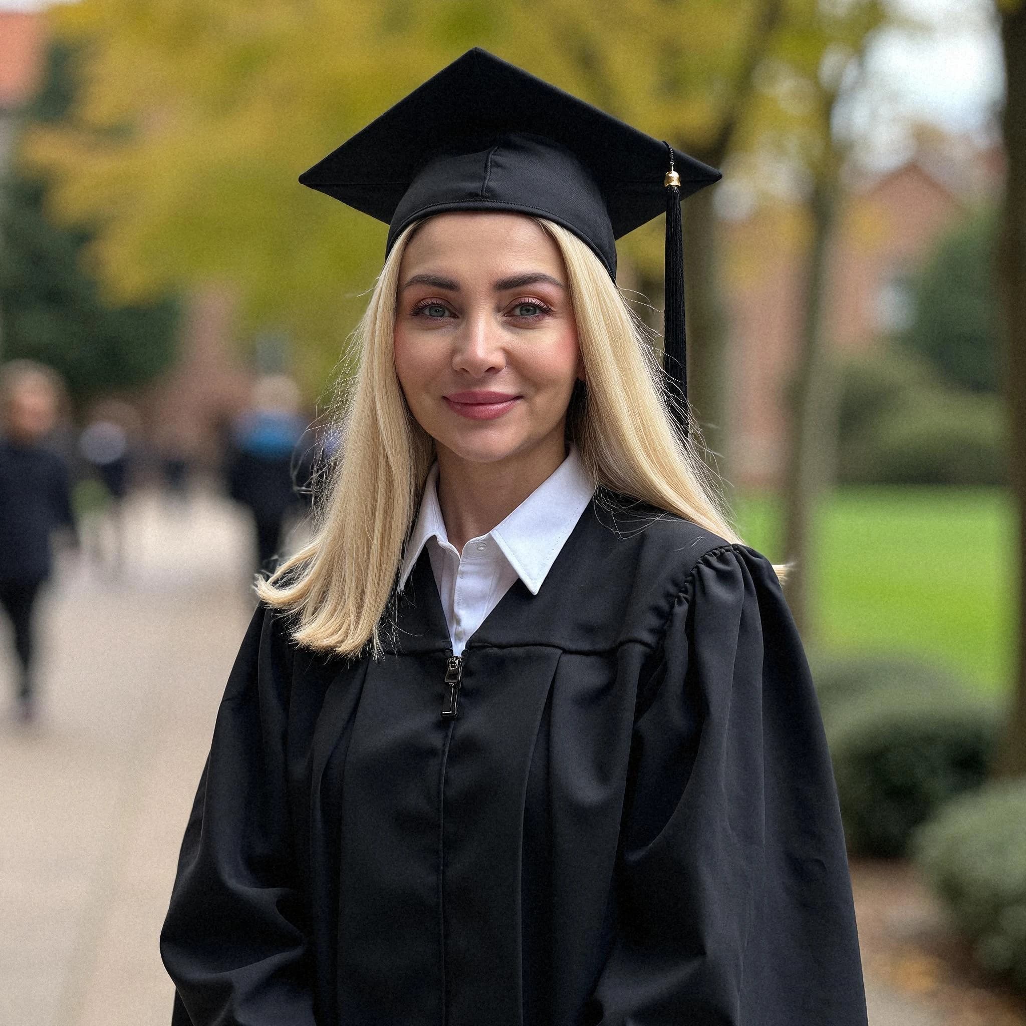 Professional headshot example: Woman Outdoors Graduation Gown Smiling 11 — LinkedInHeadshots.ai