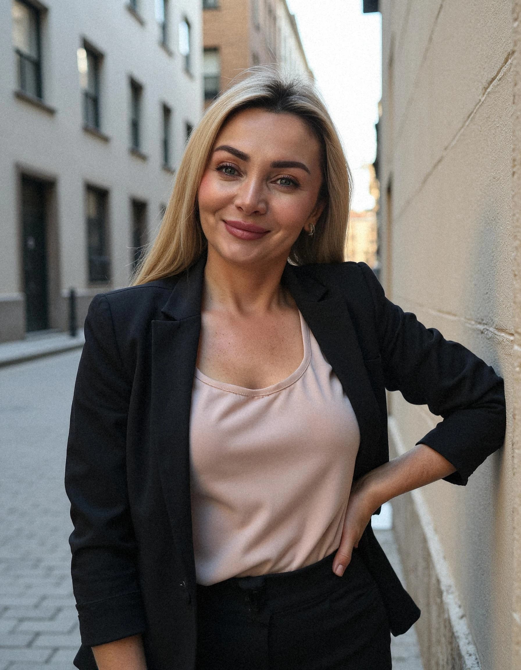 Professional headshot example: Woman Street Black Blazer Smiling — LinkedInHeadshots.ai