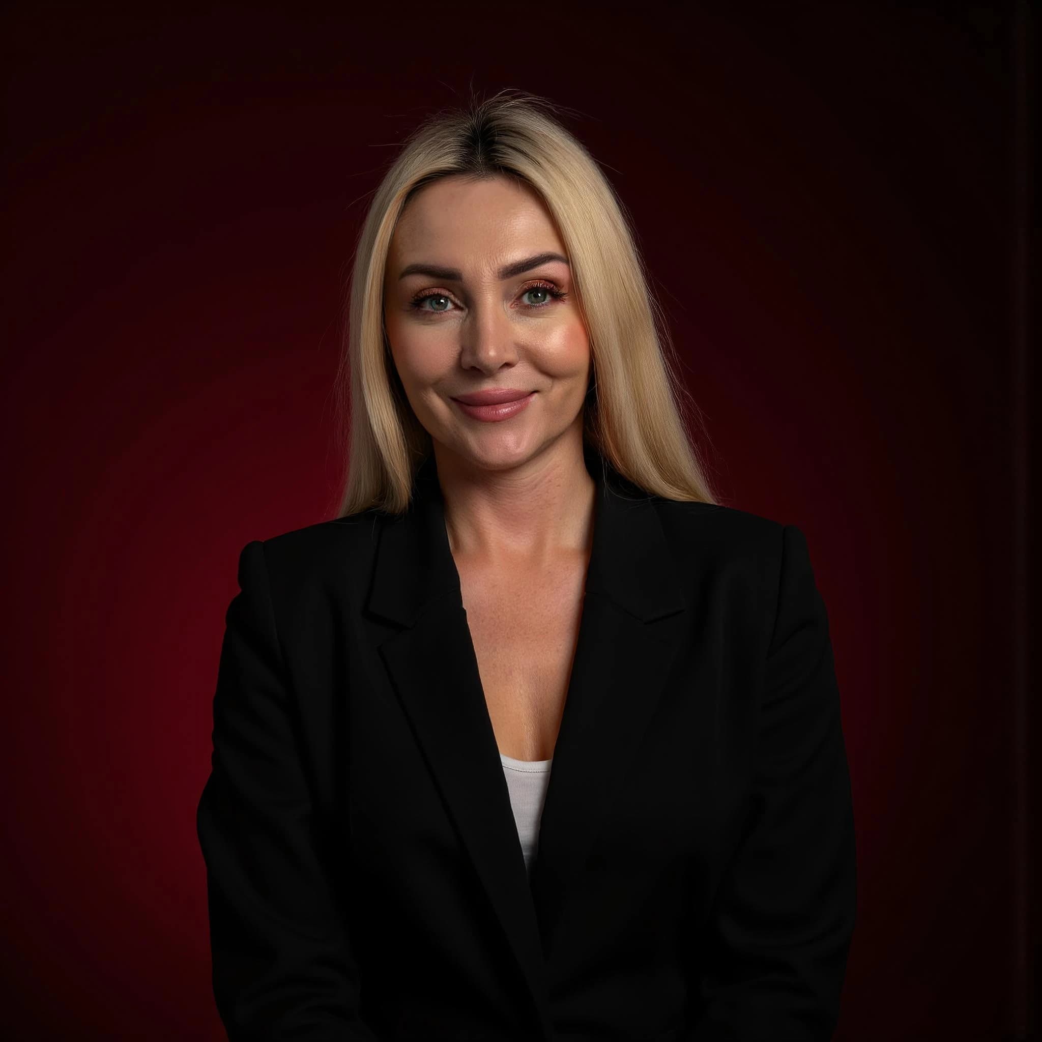 Professional headshot example: Woman Studio Black Blazer Smiling 2 — LinkedInHeadshots.ai