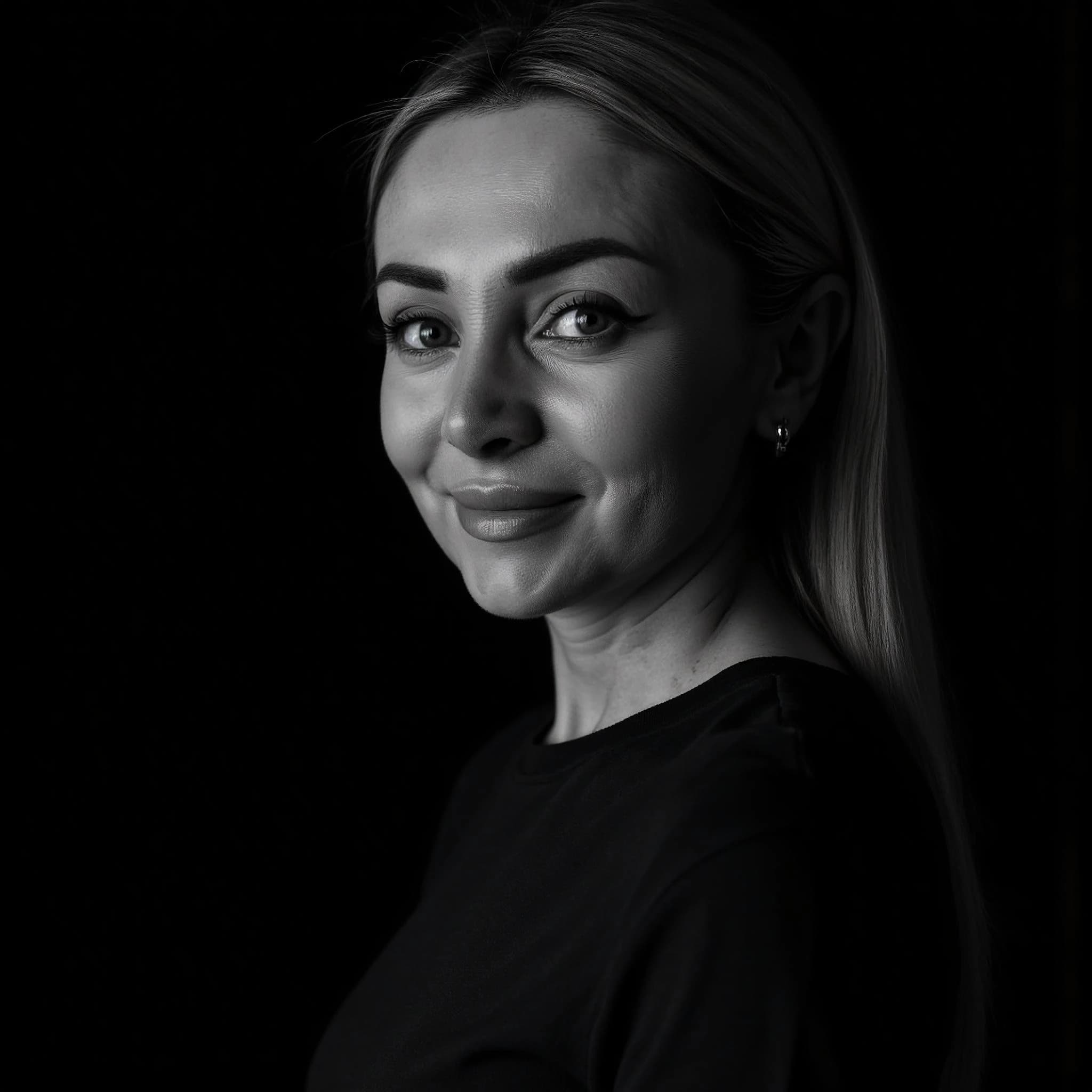 Professional headshot example: Woman Studio Black Shirt Smiling 4 — LinkedInHeadshots.ai