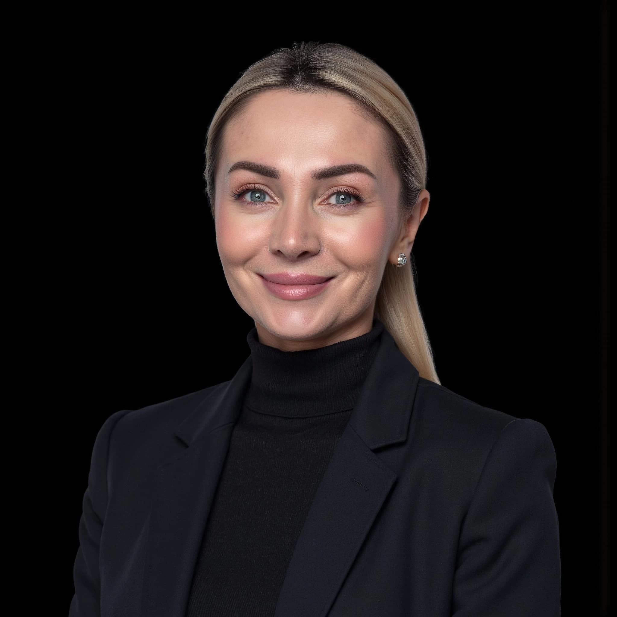 Professional headshot example: Woman Studio Black Suit Smiling 26 — LinkedInHeadshots.ai