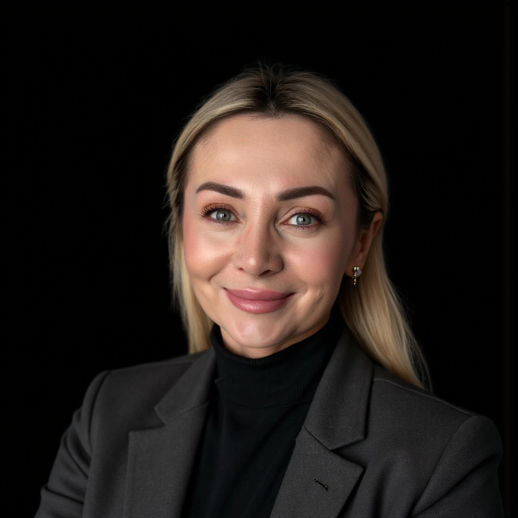 Professional headshot example: Woman Studio Black Turtleneck Smiling — LinkedInHeadshots.ai
