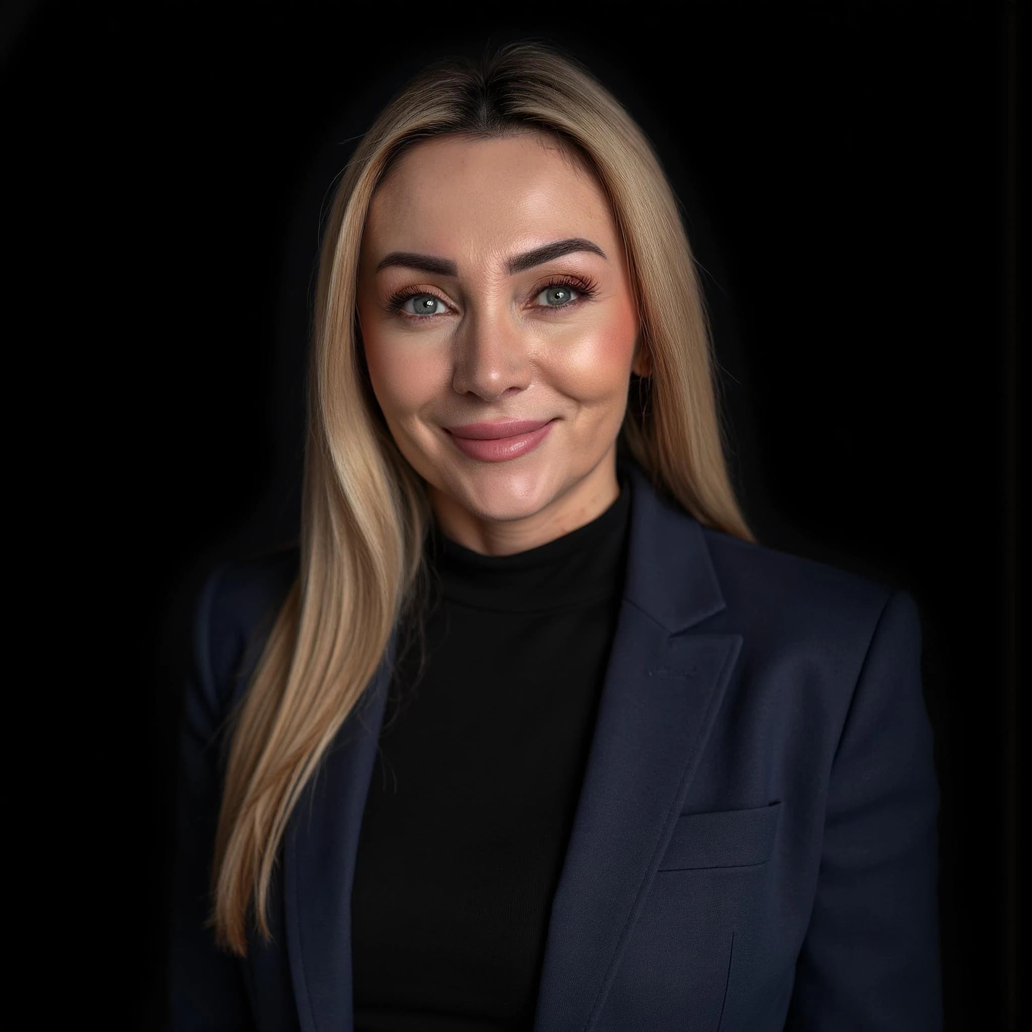 Professional headshot example: Woman Studio Blue Blazer Smiling 4 — LinkedInHeadshots.ai