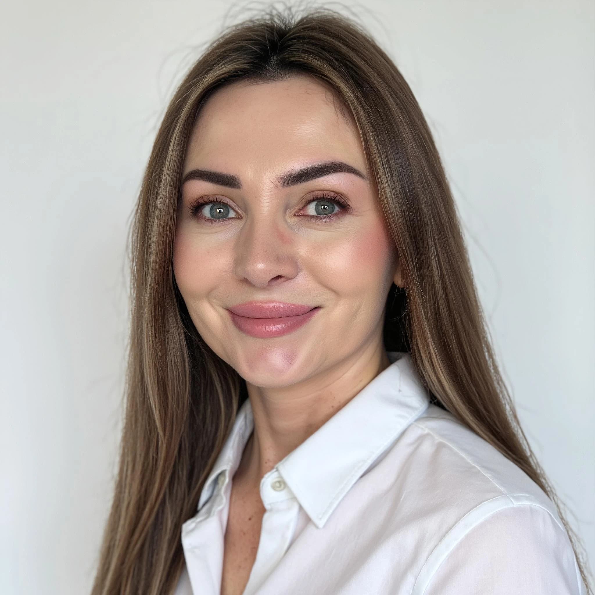 Professional headshot example: Woman Studio White Shirt Smiling 8 — LinkedInHeadshots.ai