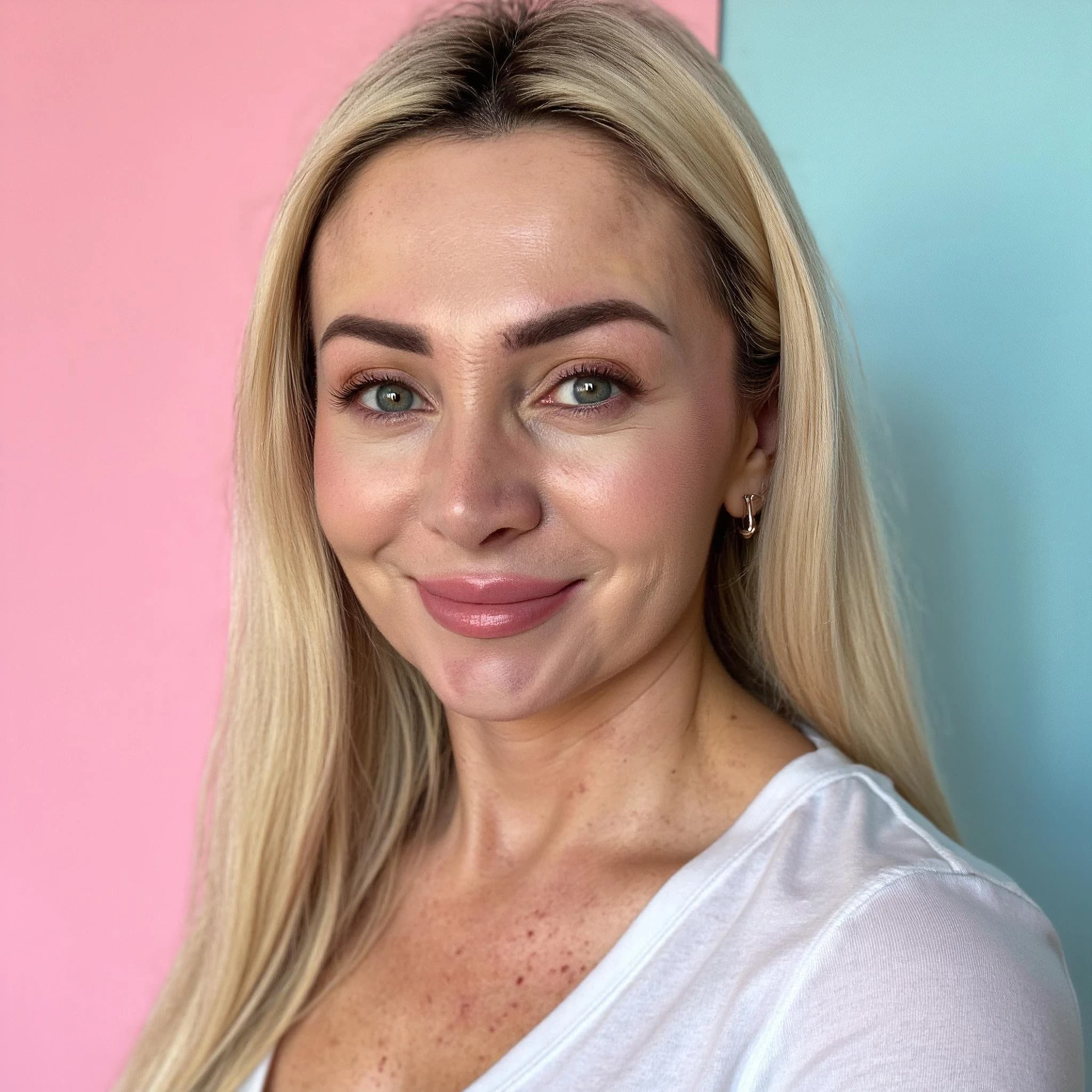 Professional headshot example: Woman Studio White Top Smiling 9 — LinkedInHeadshots.ai