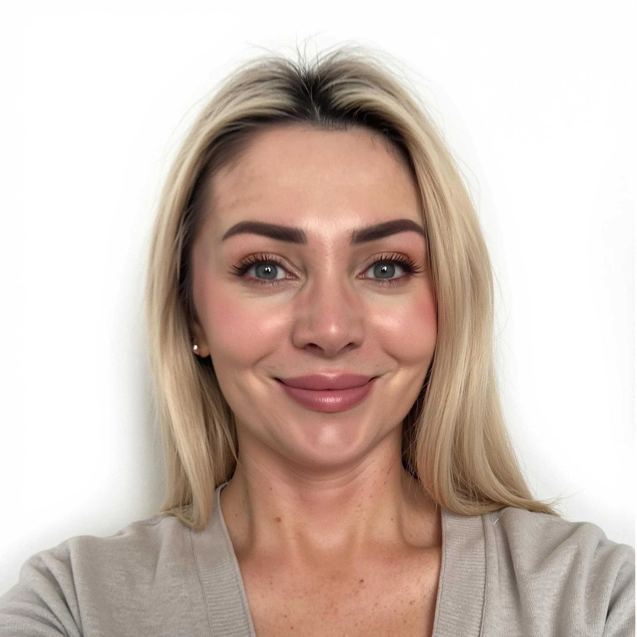 Professional headshot example: Woman White Background Beige Top Smiling — LinkedInHeadshots.ai
